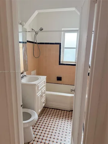 a bathroom with a sink a bath tub and a shower