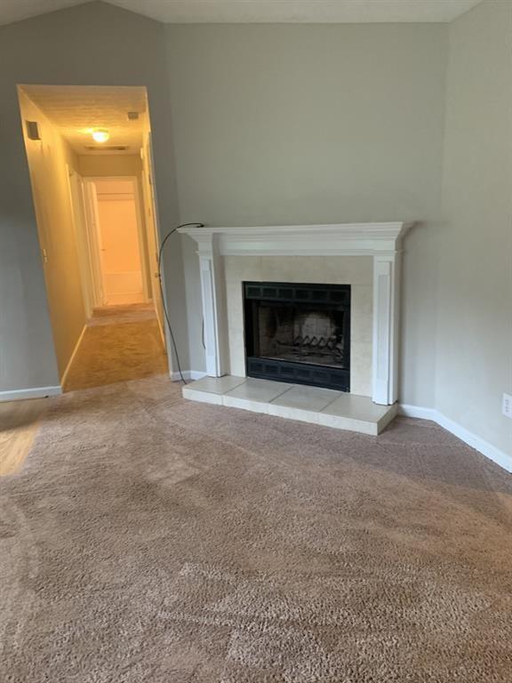 3130 Amber Lane Monroe, GA 30655 - Photo 4 of 11 a view of empty room with a fireplace