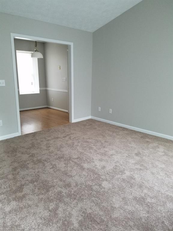 3130 Amber Lane Monroe, GA 30655 - Photo 5 of 11 an empty room with windows and closet