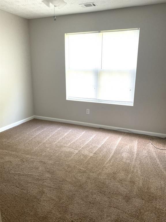 3130 Amber Lane Monroe, GA 30655 - Photo 7 of 11 an empty room with a window