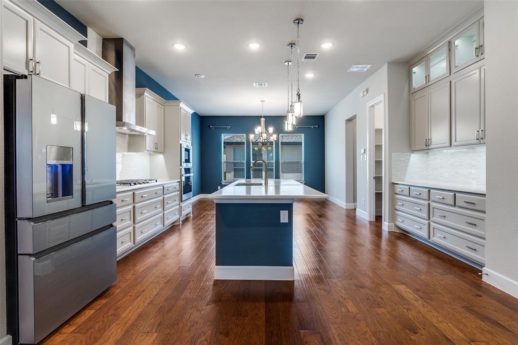 8218 Laflin Lane Dallas, TX 75231 - Photo 2 of 19 view from living space, through kitchen into dining area.