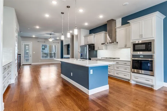 a view of a brick house with a large window