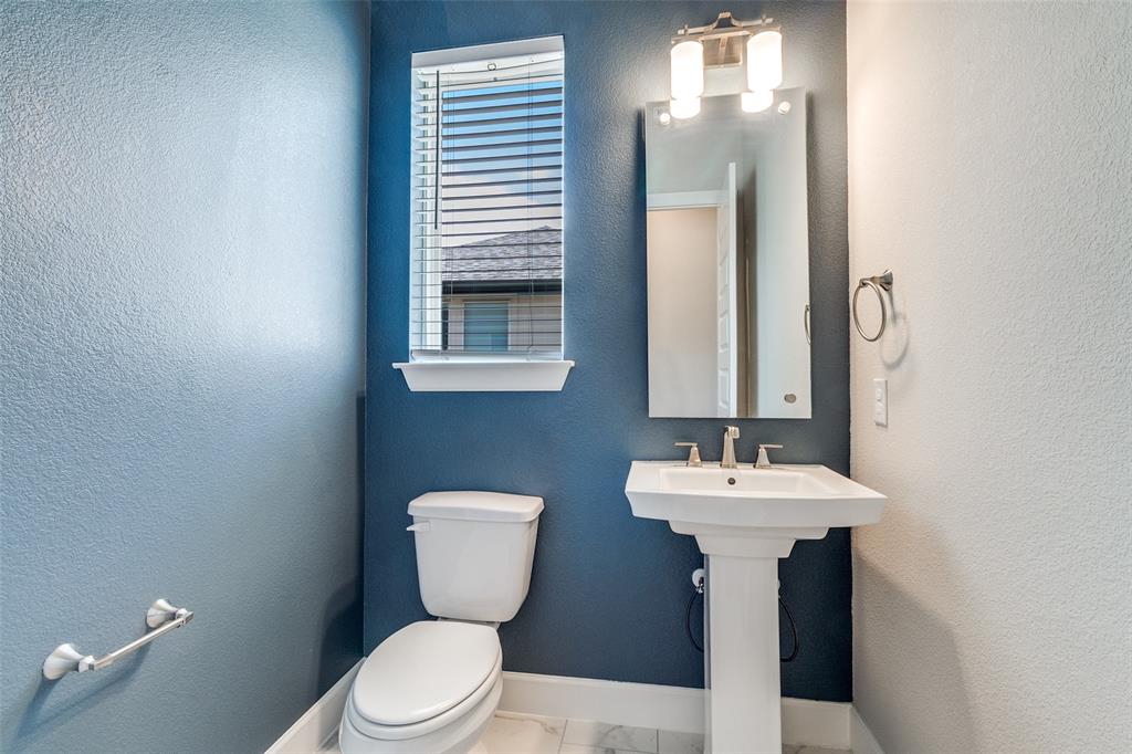 8218 Laflin Lane Dallas, TX 75231 - Photo 7 of 19 second floor guest half bath