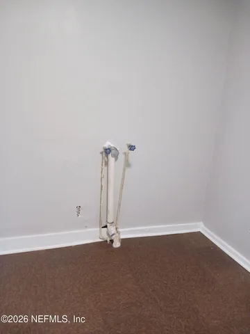 a view of a room with an empty space