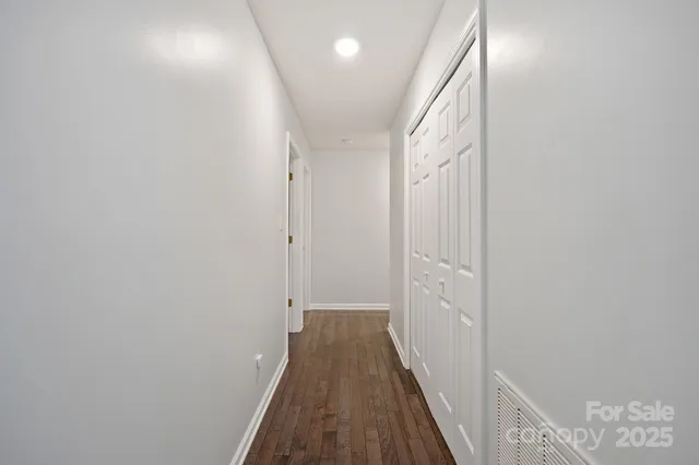 a kitchen with a sink a stove and cabinets