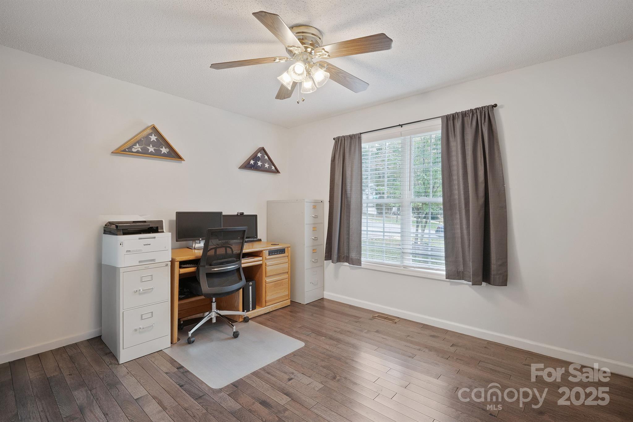 2714 Mauser Drive Newton, NC 28658 - Photo 21 of 38 a view of a workspace with furniture and a window