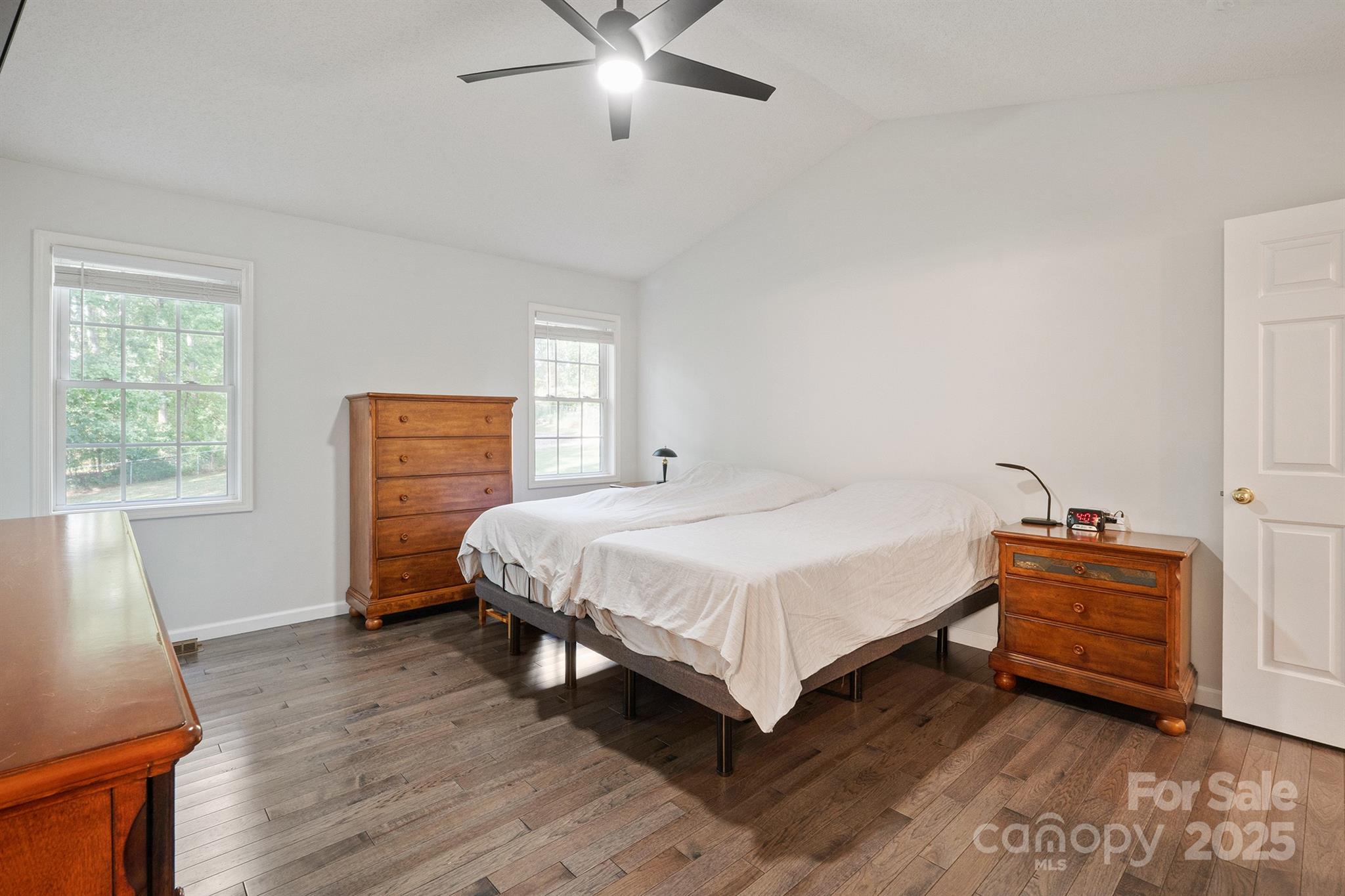 2714 Mauser Drive Newton, NC 28658 - Photo 28 of 38 a spacious bedroom with a bed and a window
