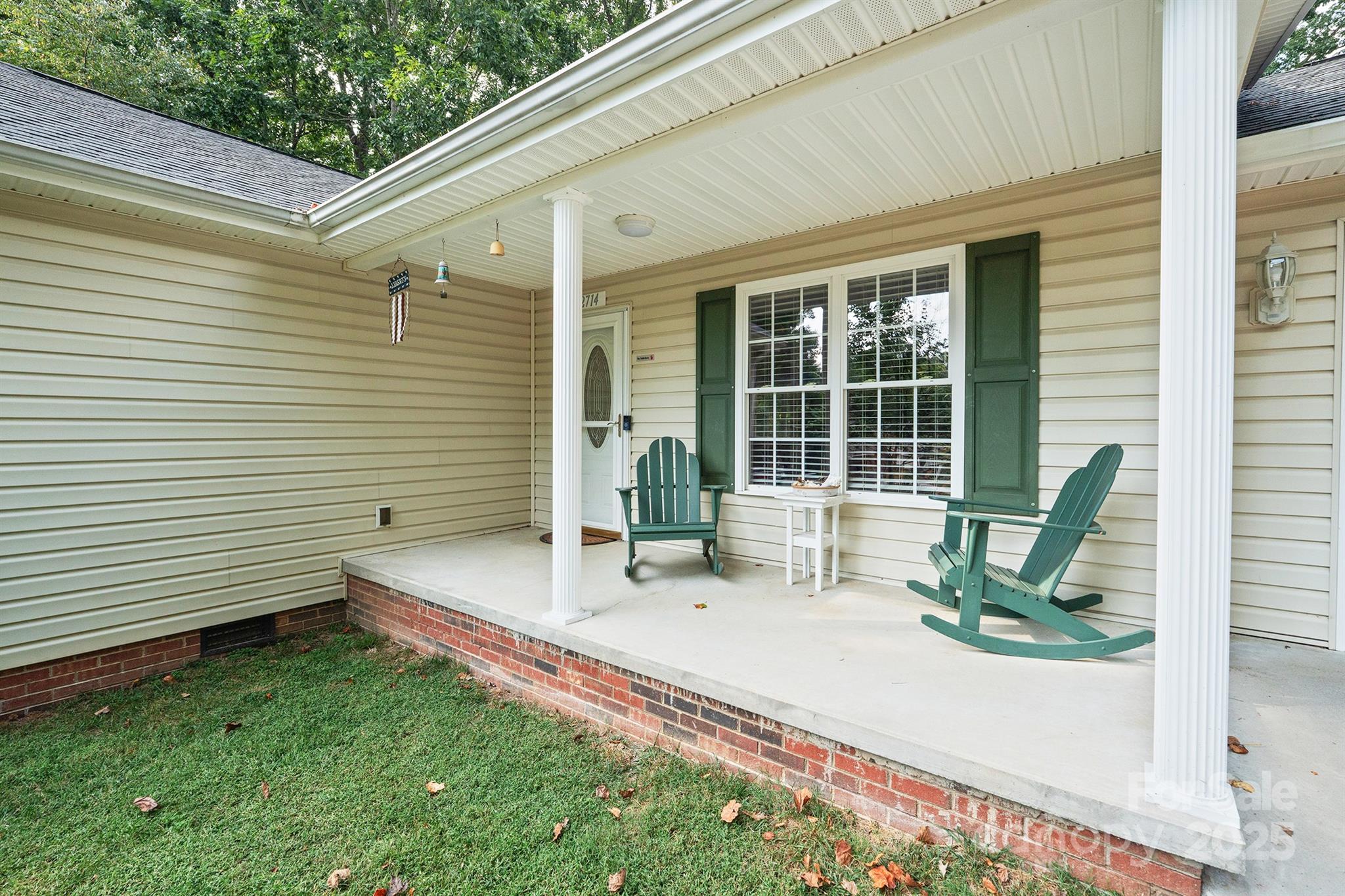 2714 Mauser Drive Newton, NC 28658 - Photo 4 of 38 a house view with a sitting space and garden