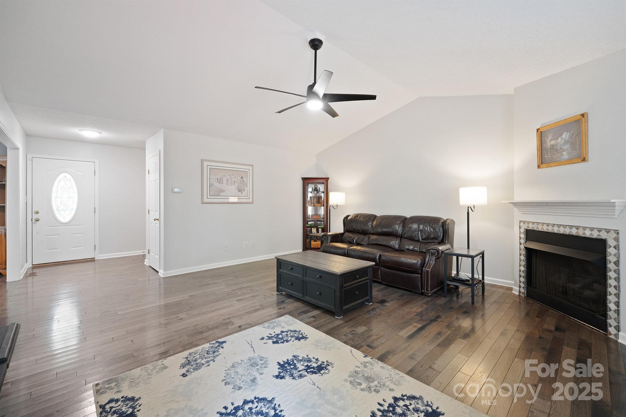 2714 Mauser Drive Newton, NC 28658 - Photo 7 of 38 a living room with furniture and a fireplace