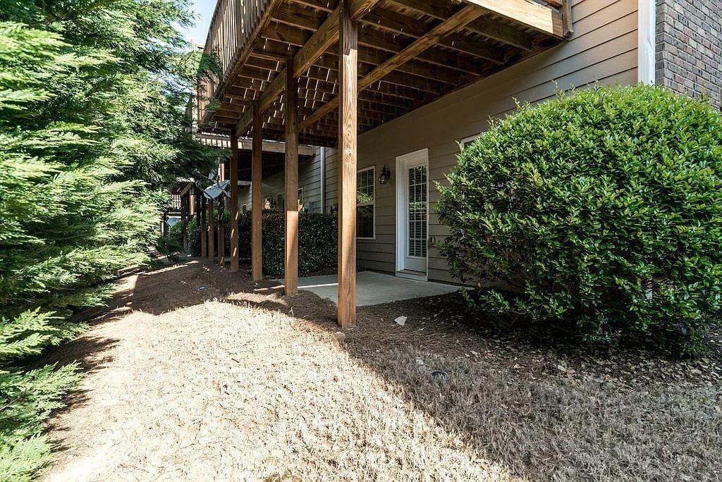 6120 Joybrook Road Duluth, GA 30097 - Photo 28 of 30 front view of a house with a yard