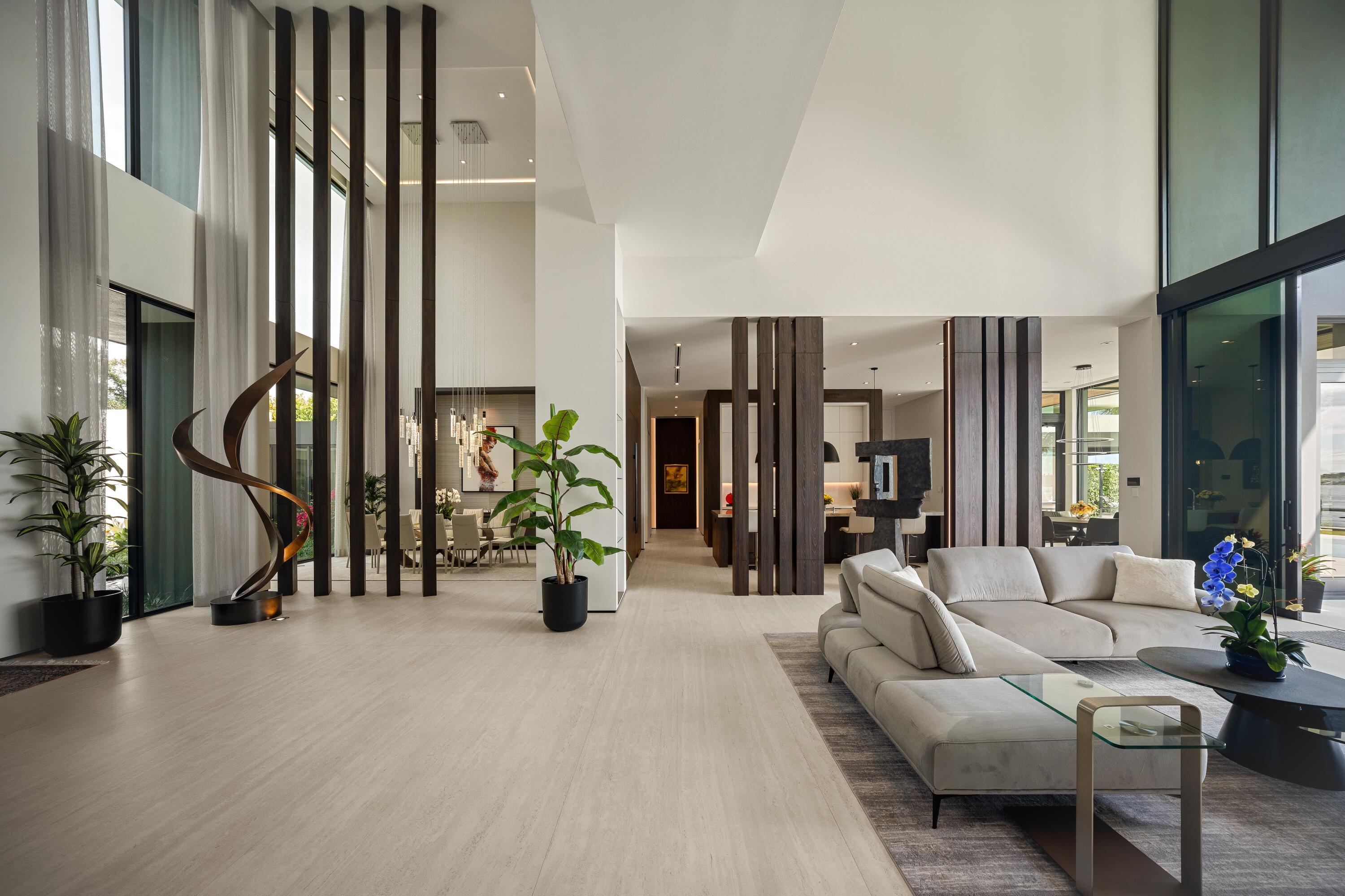 5211 Pennock Point Road Jupiter, FL 33458 - Photo 13 of 69 a living room with furniture and a potted plant