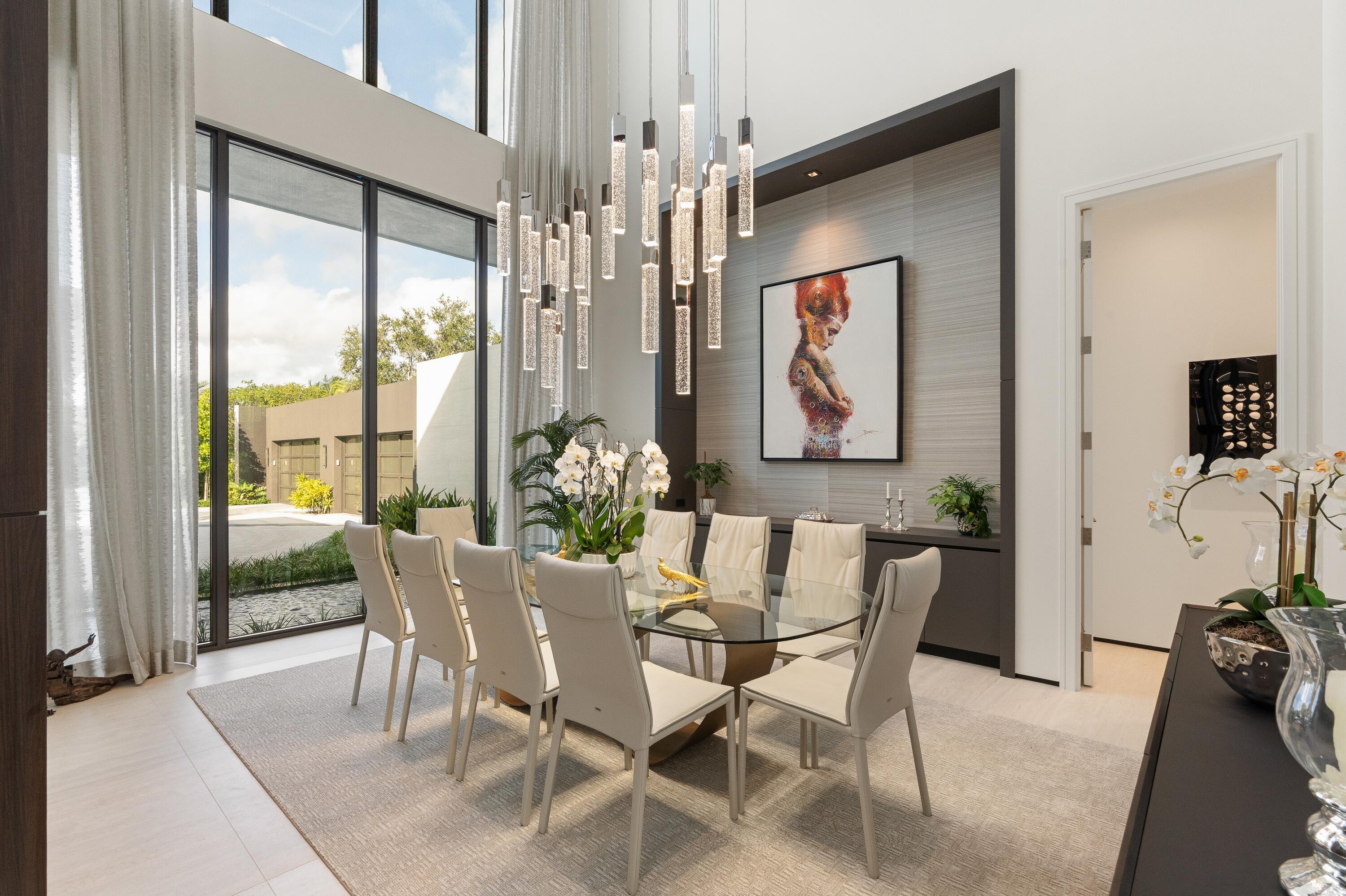 5211 Pennock Point Road Jupiter, FL 33458 - Photo 15 of 69 a view of a dining room with furniture window and outside view