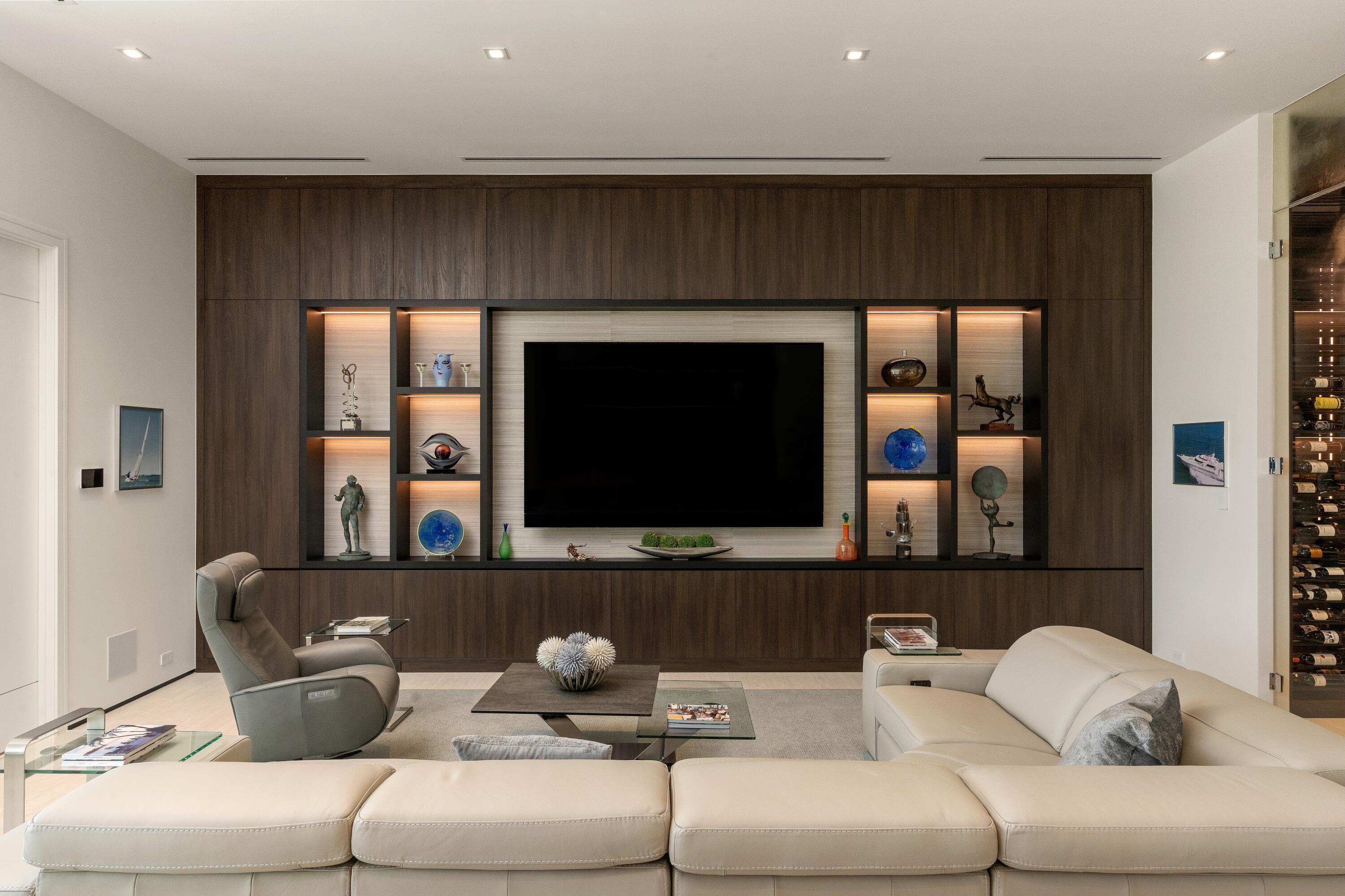 5211 Pennock Point Road Jupiter, FL 33458 - Photo 23 of 69 a living room with a couch and a flat screen tv