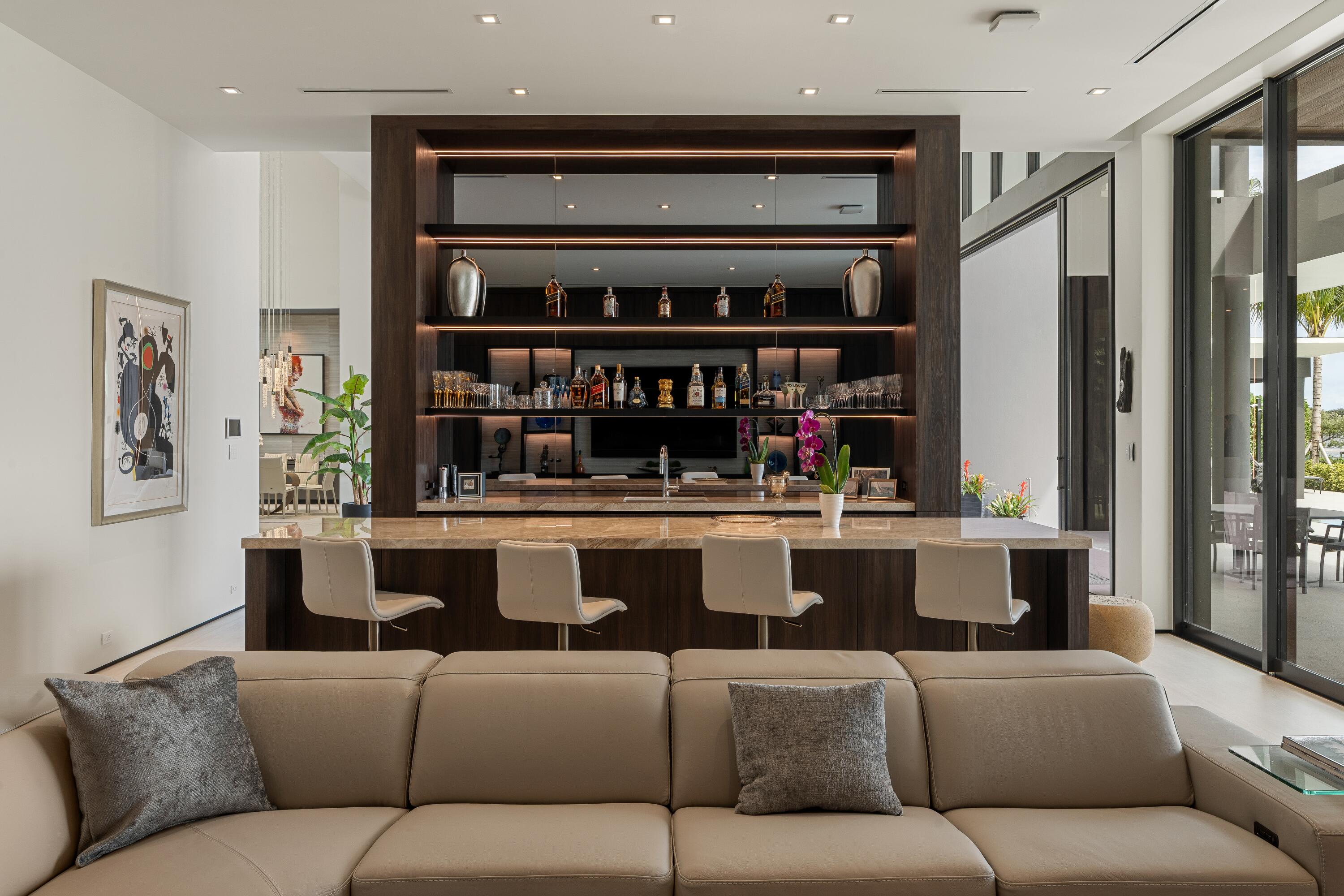 5211 Pennock Point Road Jupiter, FL 33458 - Photo 24 of 69 a living room with furniture cabinets and window