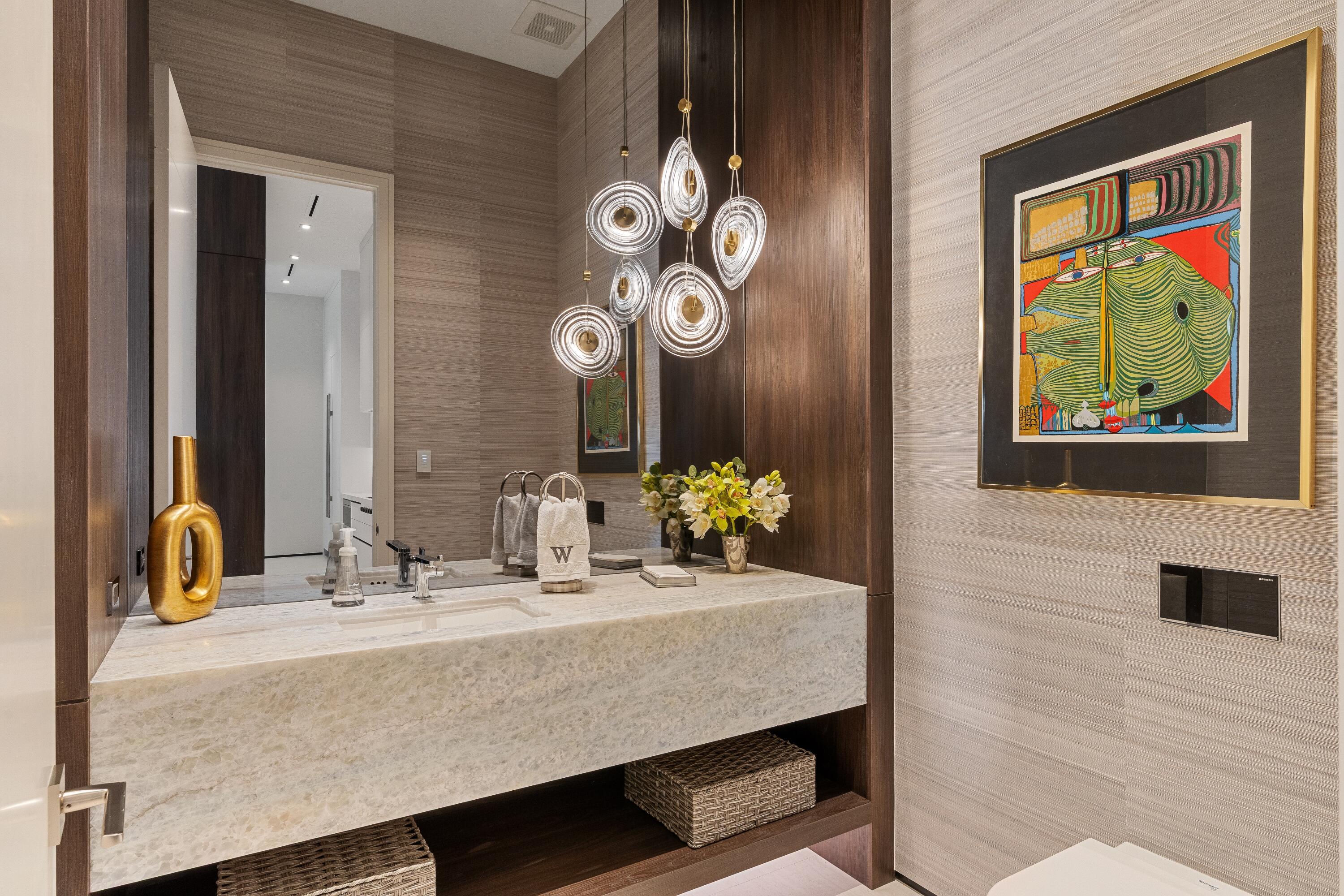 5211 Pennock Point Road Jupiter, FL 33458 - Photo 33 of 69 a bathroom with a sink double vanity and a mirror