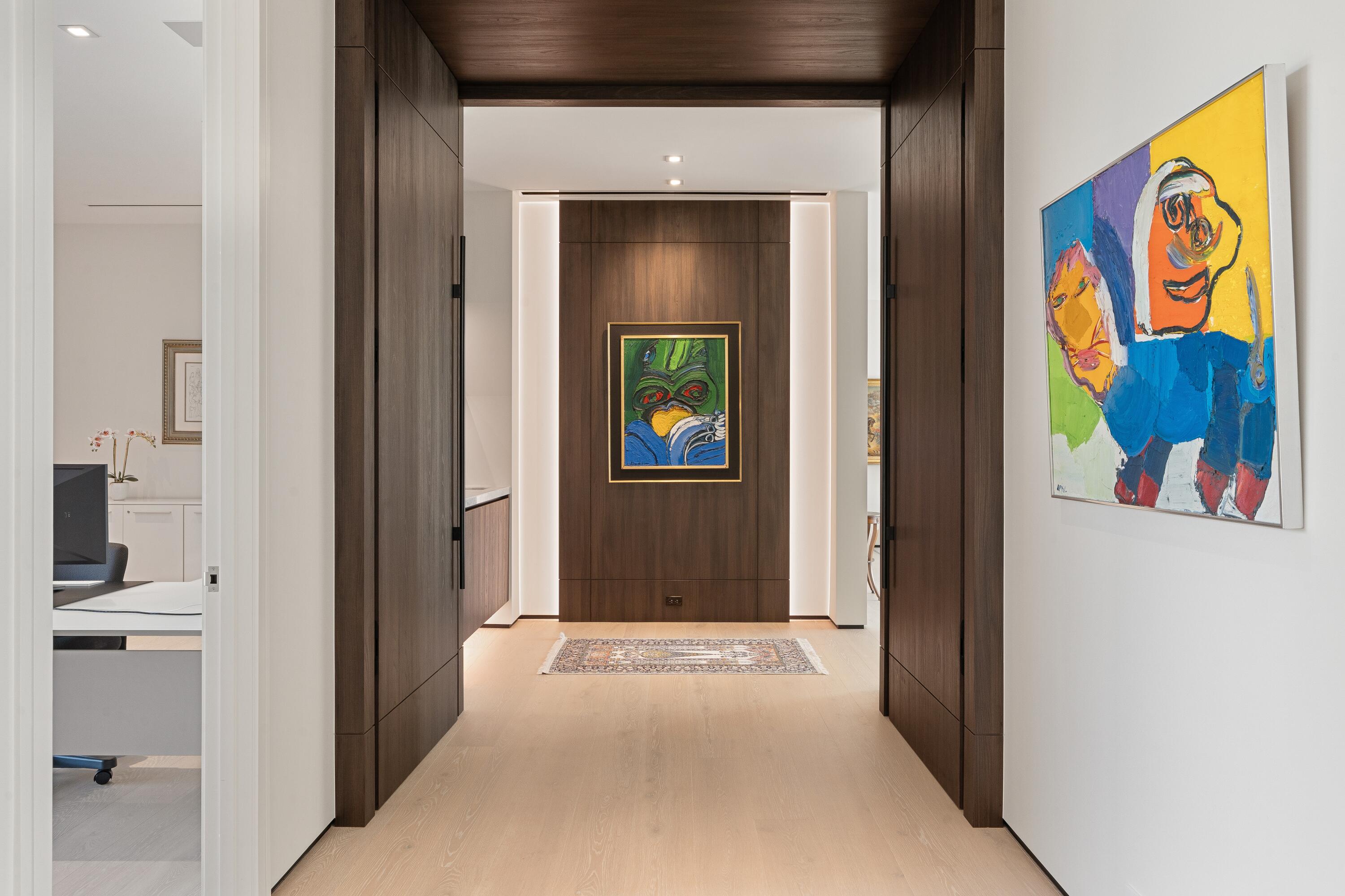 5211 Pennock Point Road Jupiter, FL 33458 - Photo 38 of 69 a view of a hallway with wooden floor