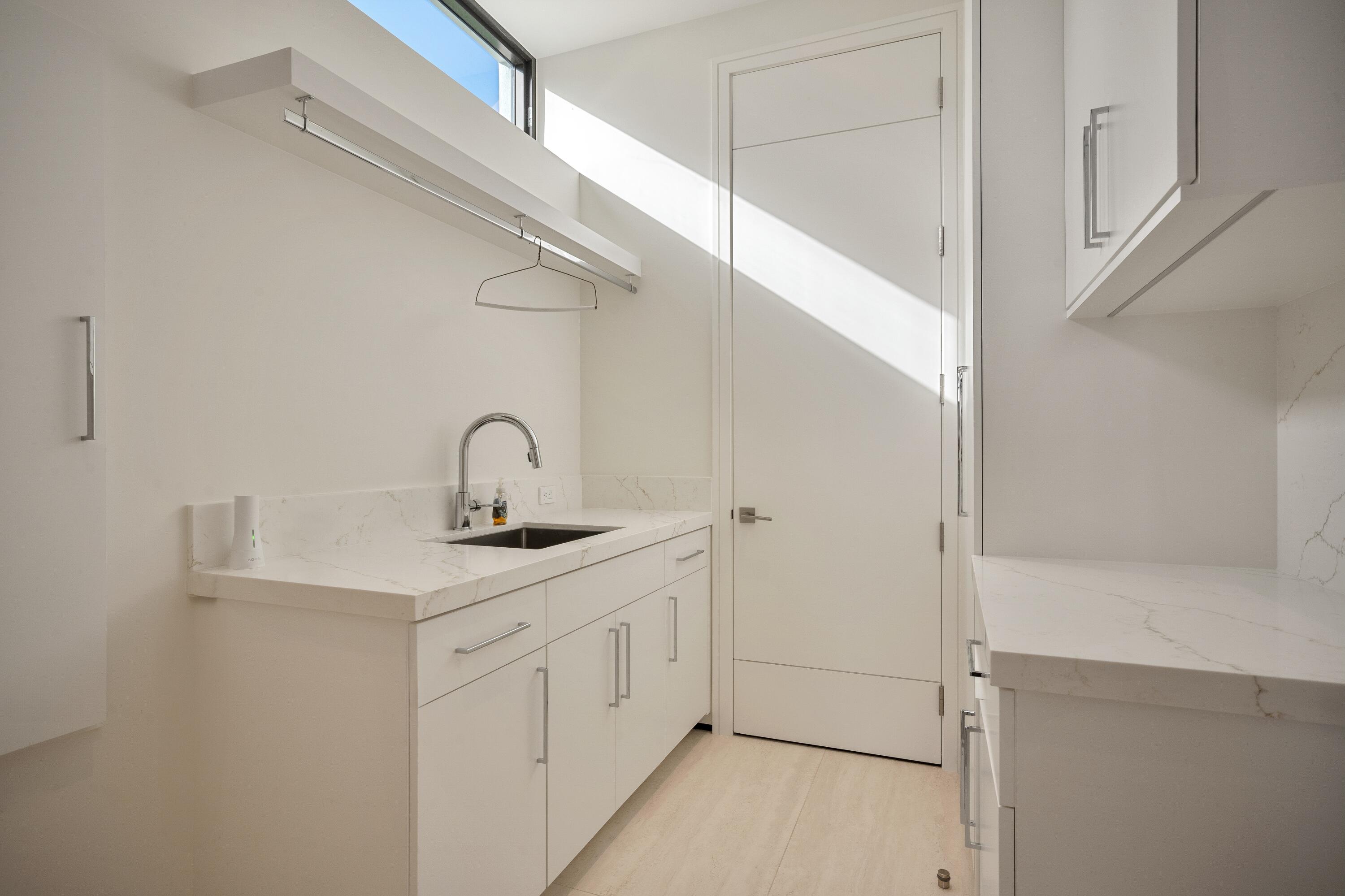 5211 Pennock Point Road Jupiter, FL 33458 - Photo 55 of 69 a close view of a sink and tap