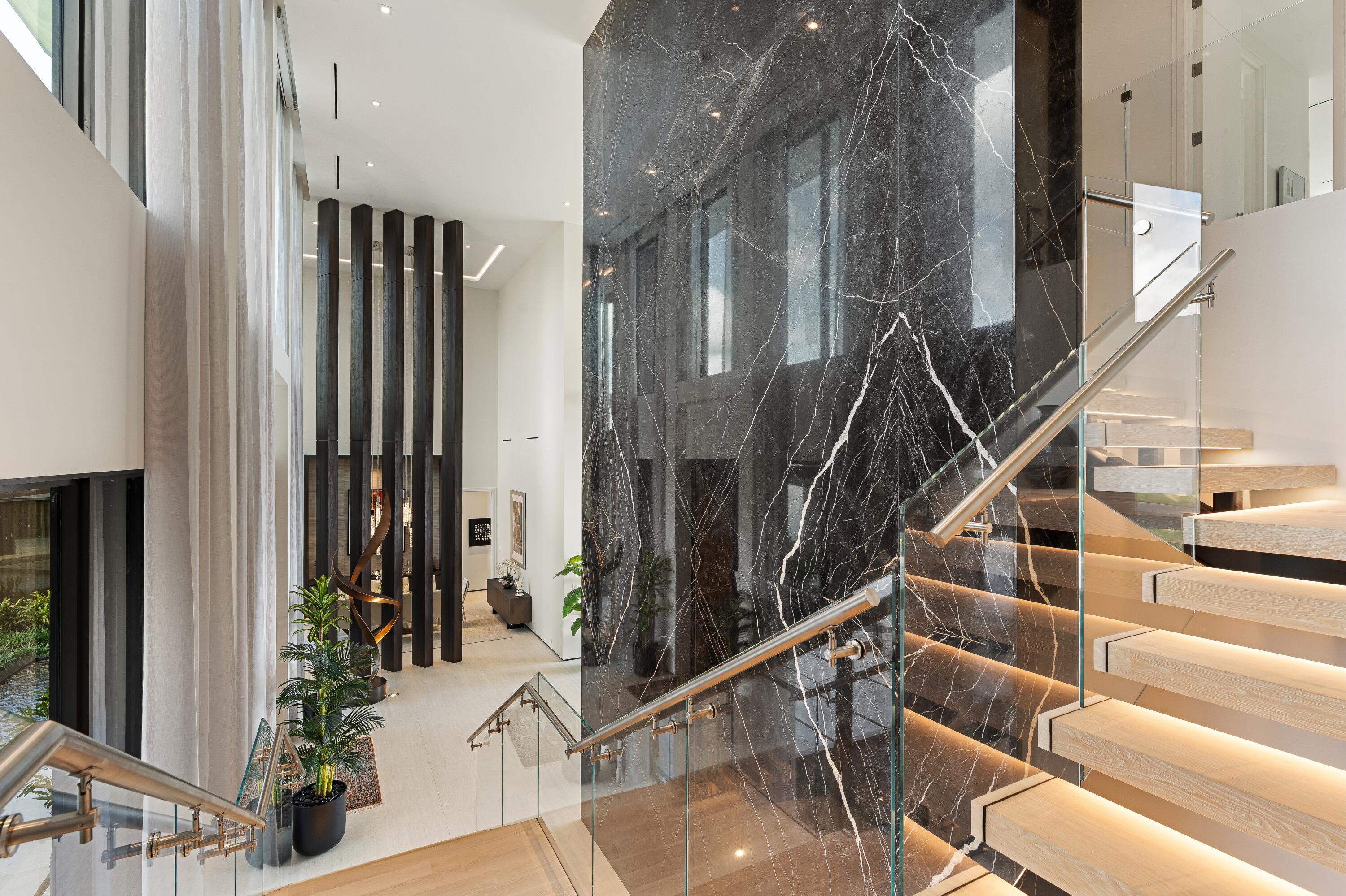 5211 Pennock Point Road Jupiter, FL 33458 - Photo 56 of 69 a view of entryway and hall with wooden floor