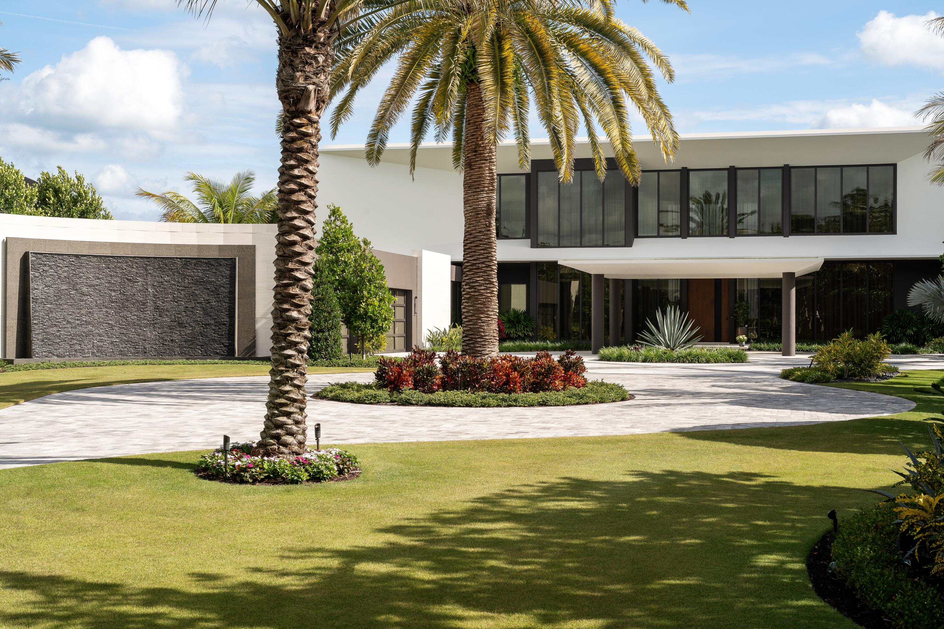 5211 Pennock Point Road Jupiter, FL 33458 - Photo 6 of 69 a view of a house with swimming pool and sitting area