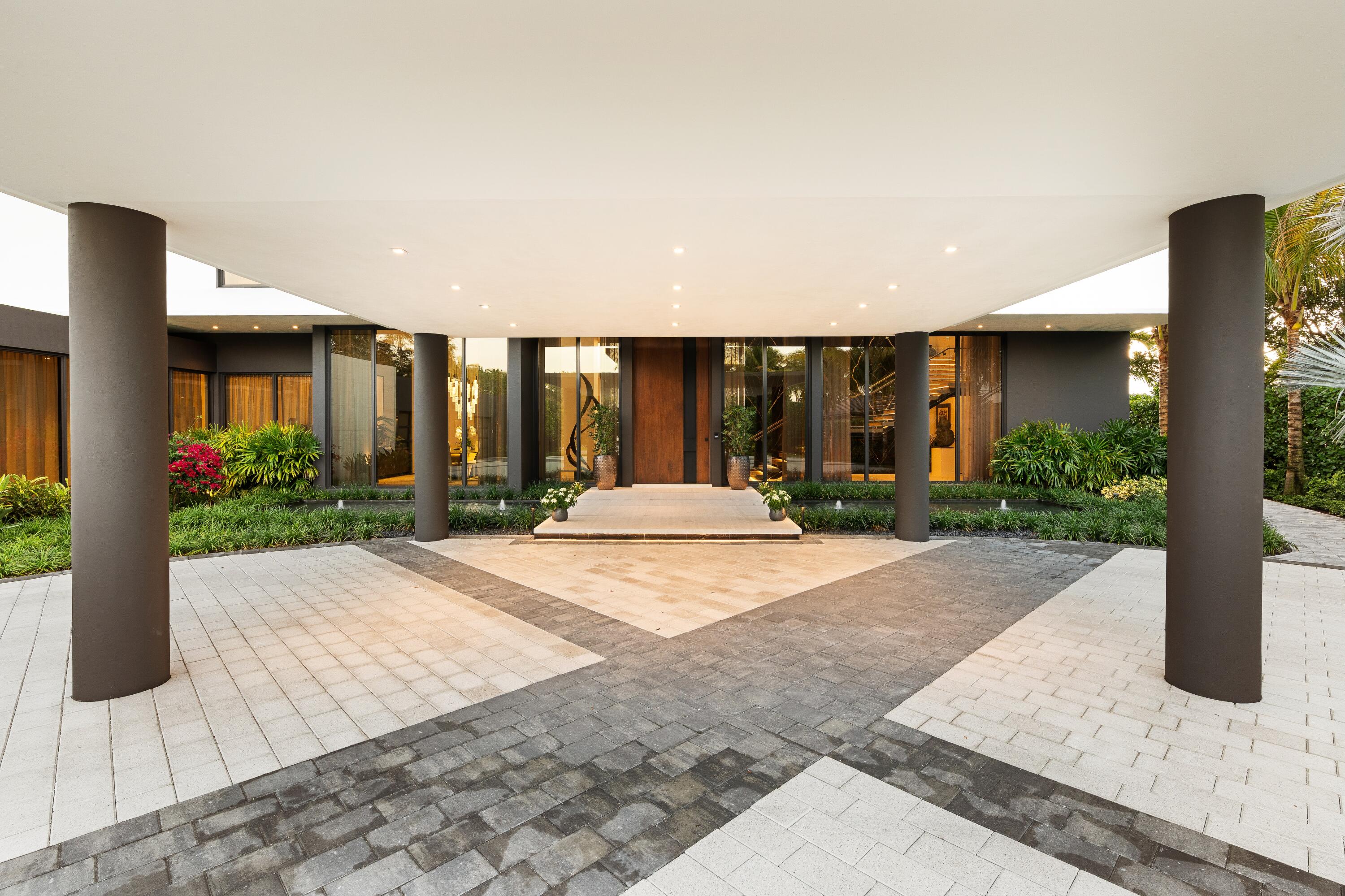 5211 Pennock Point Road Jupiter, FL 33458 - Photo 9 of 69 a view of a house with backyard and tree