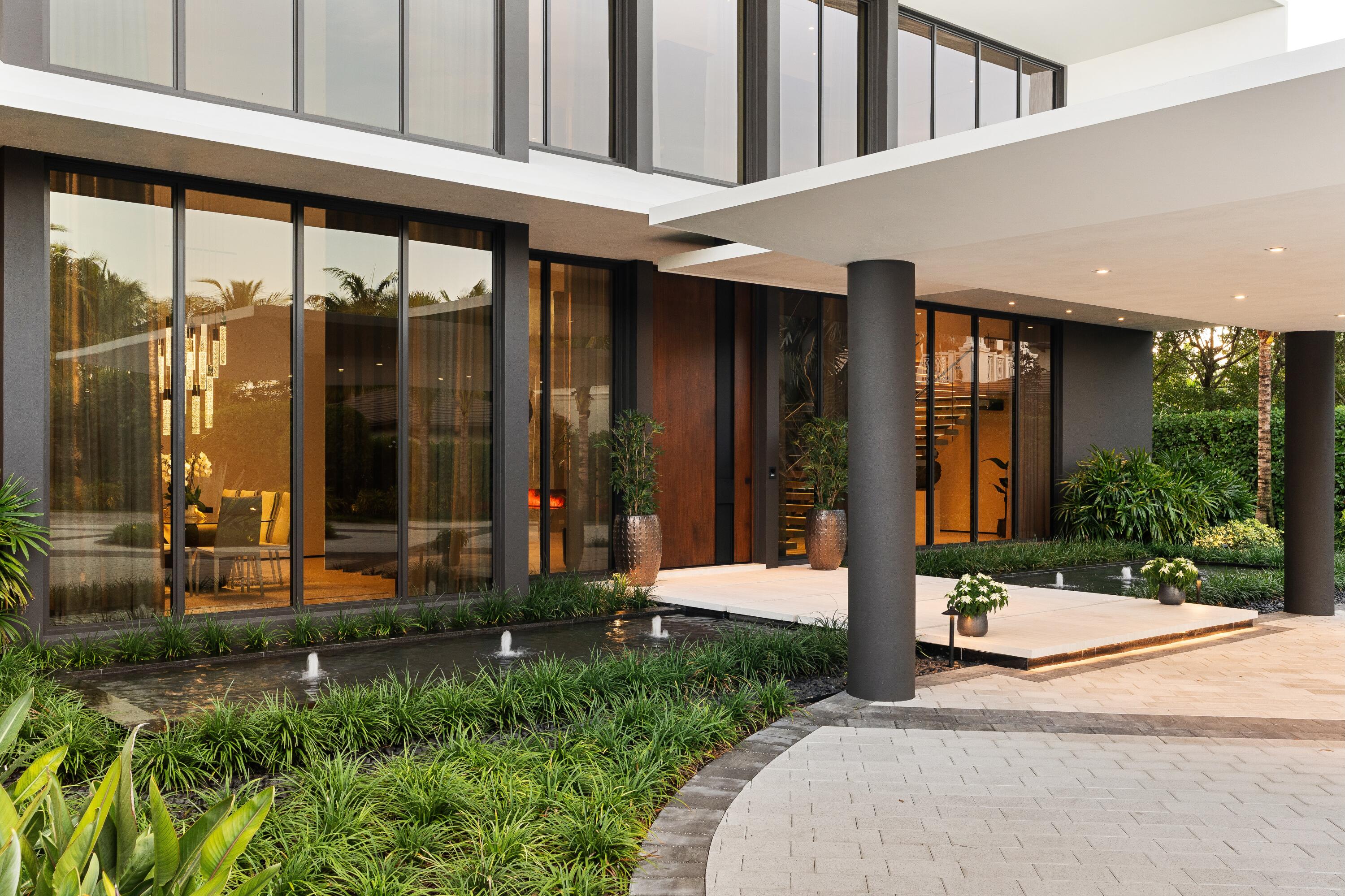 5211 Pennock Point Road Jupiter, FL 33458 - Photo 10 of 69 a view of a building with shower and garden