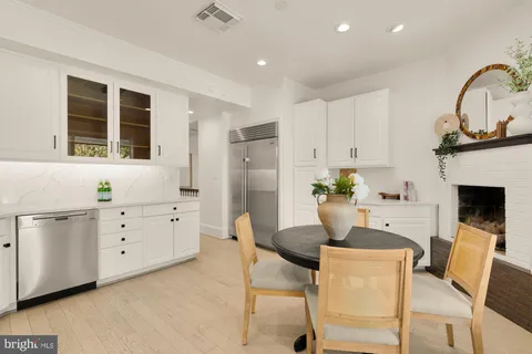 a view of house with outdoor seating space