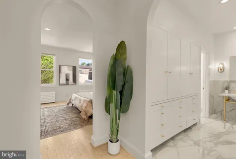 a bathroom with a mirror and a shower