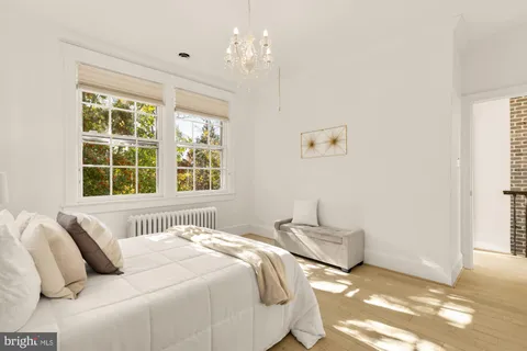a kitchen with stainless steel appliances granite countertop a stove and a refrigerator