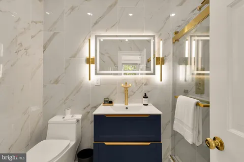 a view of an empty room with a flat screen tv