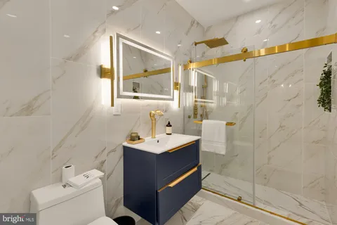 a view of a livingroom with a flat screen tv