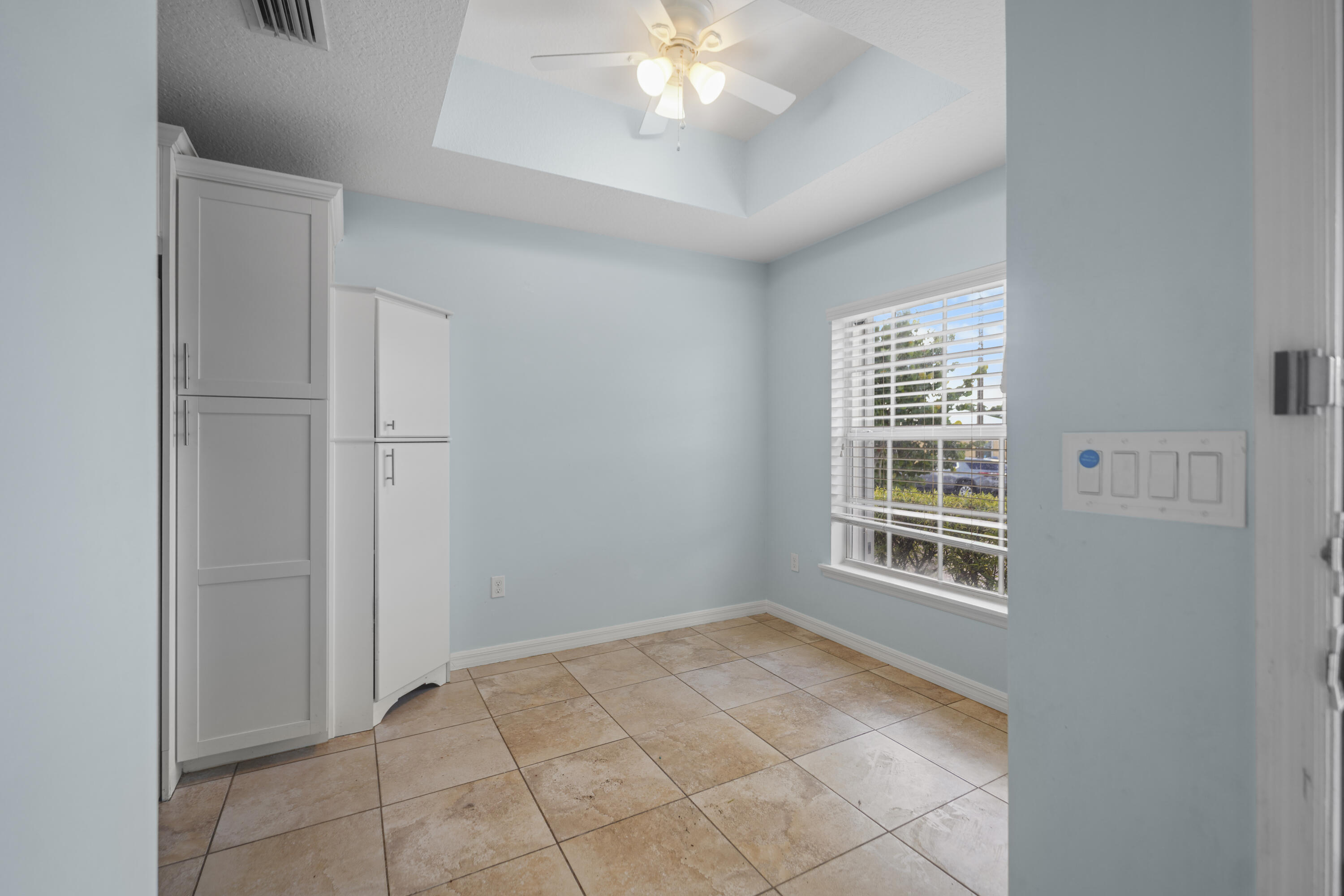 3199 Southeast Lime Tree Trail Stuart, FL 34997 - Photo 14 of 34 a view of an empty room with a window