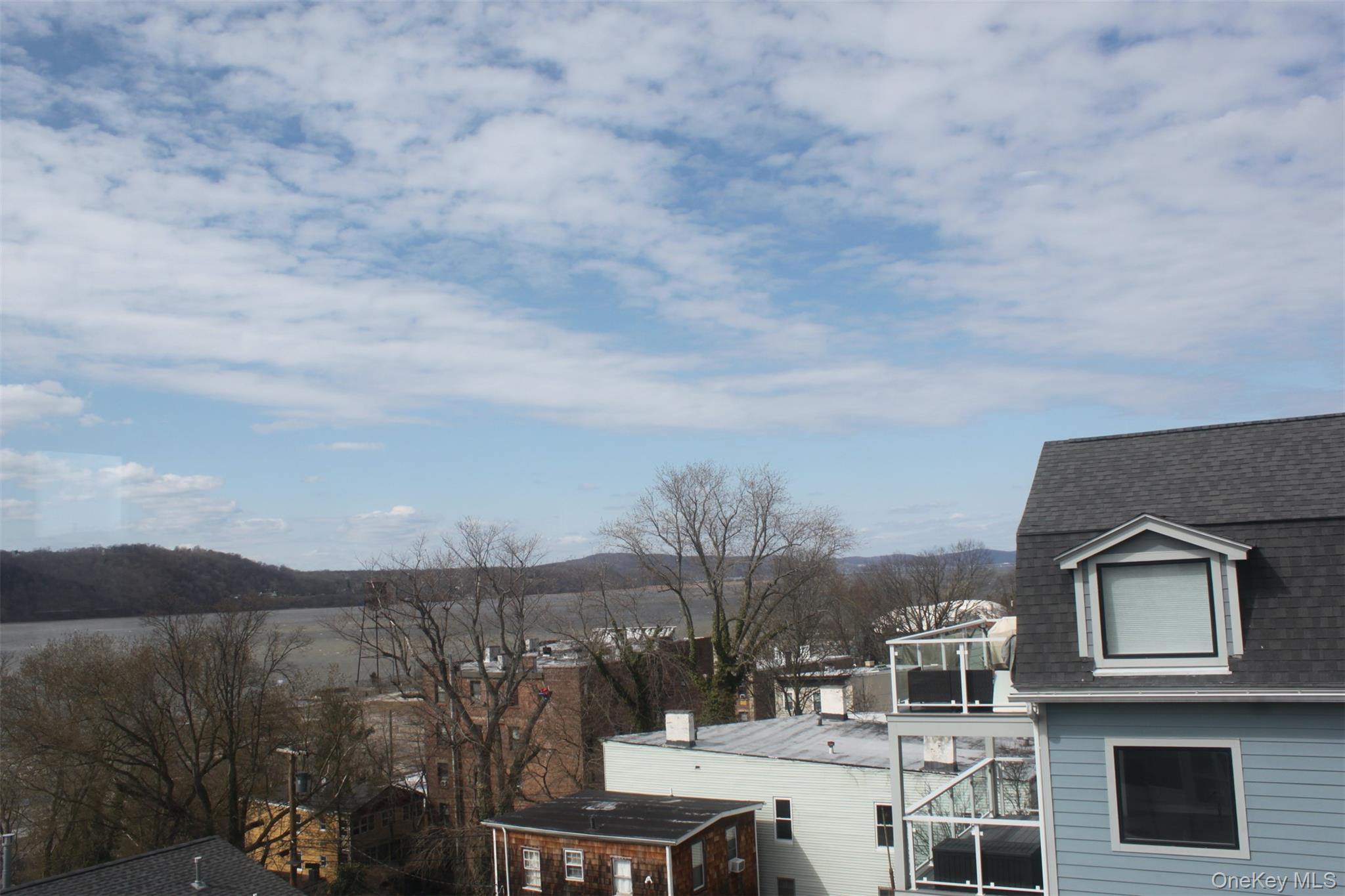 451 Warburton Avenue, Unit 3 Hastings-on-Hudson, NY 10706 - Photo 16 of 16 a view of roof with city view