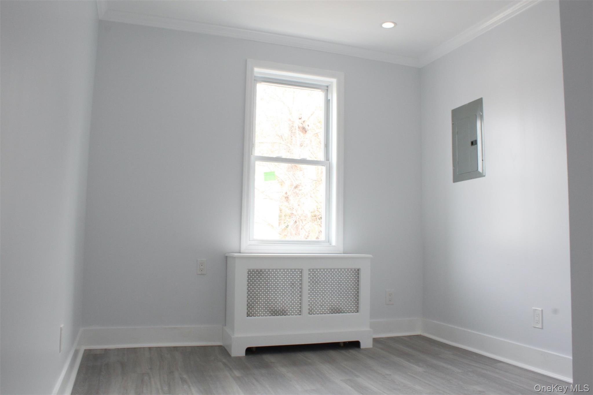 451 Warburton Avenue, Unit 3 Hastings-on-Hudson, NY 10706 - Photo 10 of 16 a view of an empty room with a window