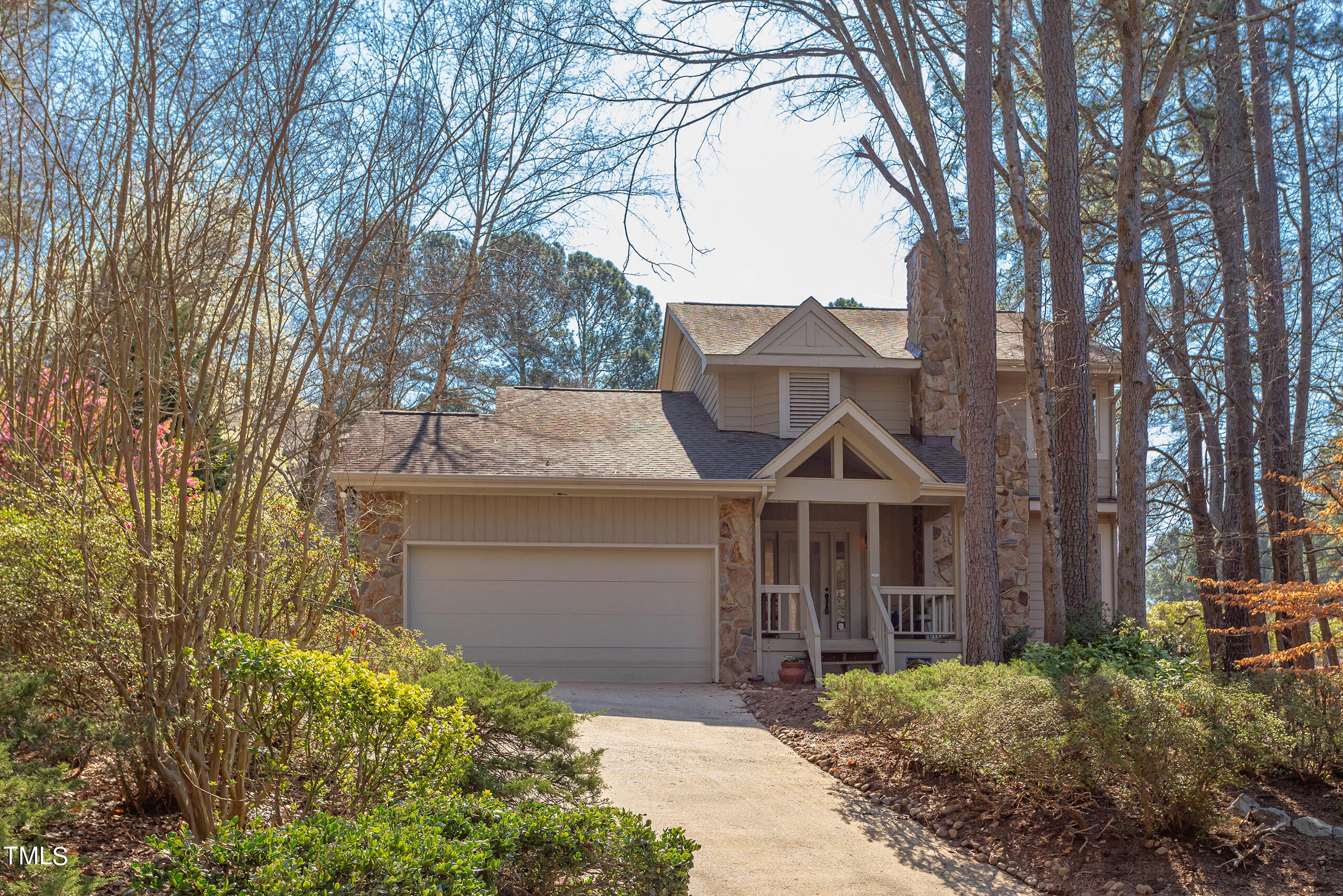 30 Sandstone Ridge Drive Durham, NC 27713 - Photo 1 of 65 a front view of a house with a yard