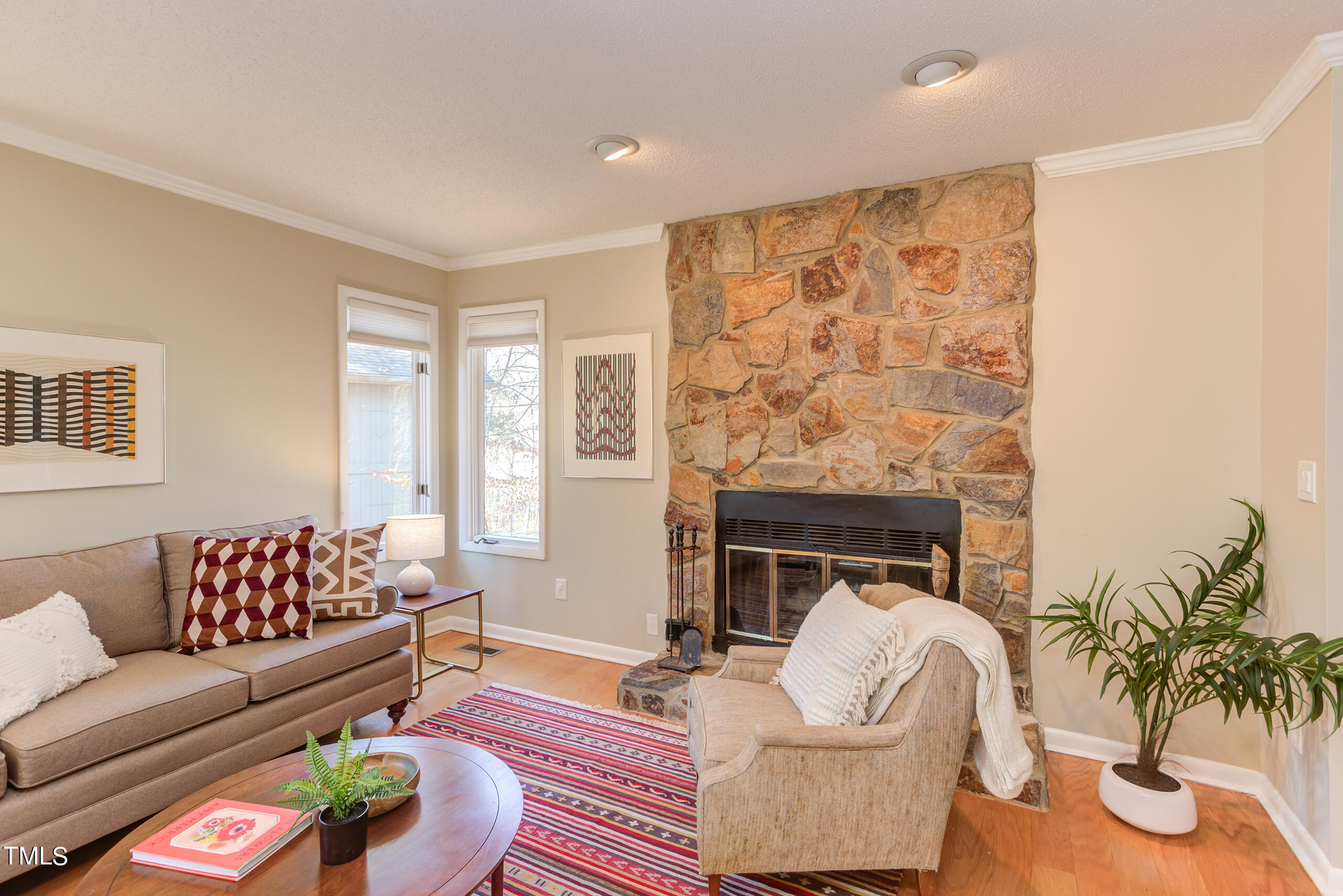 30 Sandstone Ridge Drive Durham, NC 27713 - Photo 11 of 65 a living room with furniture and a fireplace