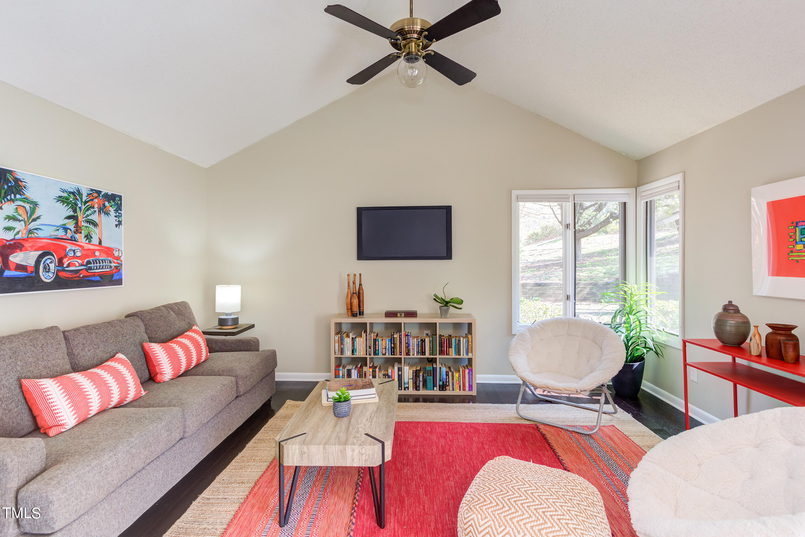 30 Sandstone Ridge Drive Durham, NC 27713 - Photo 33 of 65 a living room with furniture and a flat screen tv