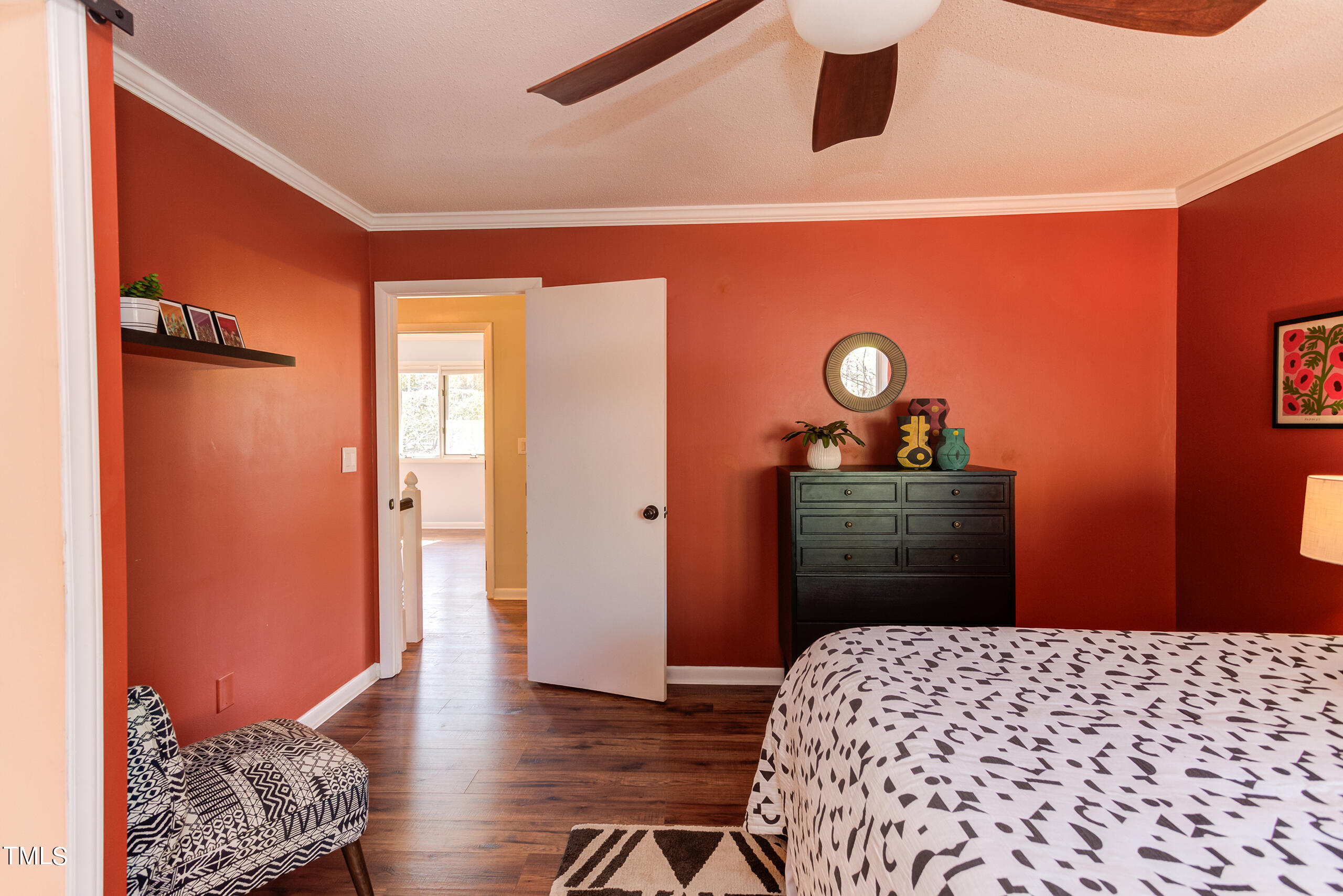 30 Sandstone Ridge Drive Durham, NC 27713 - Photo 36 of 65 a bedroom with a bed and wooden floor