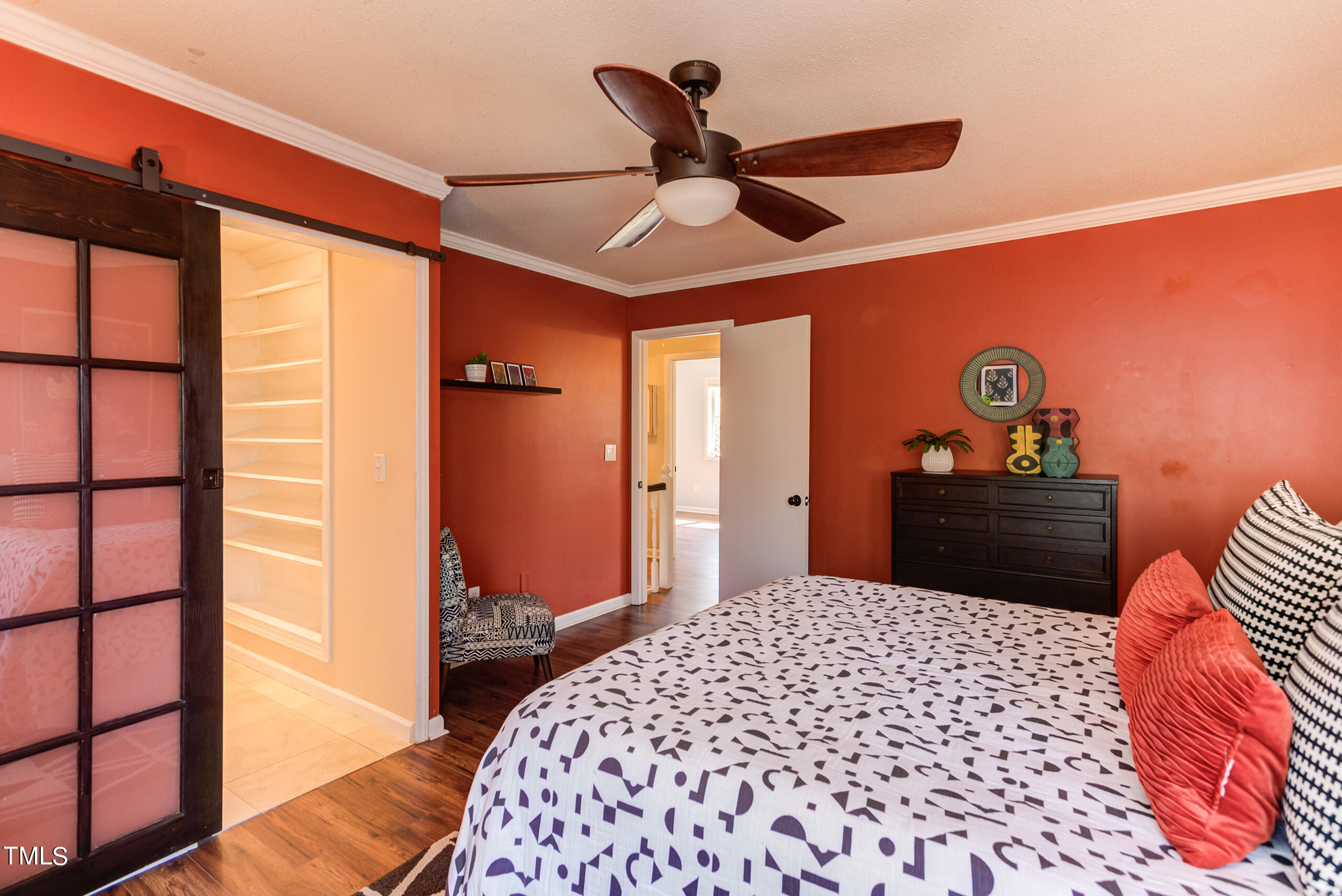 30 Sandstone Ridge Drive Durham, NC 27713 - Photo 37 of 65 a bedroom with a bed and a dresser