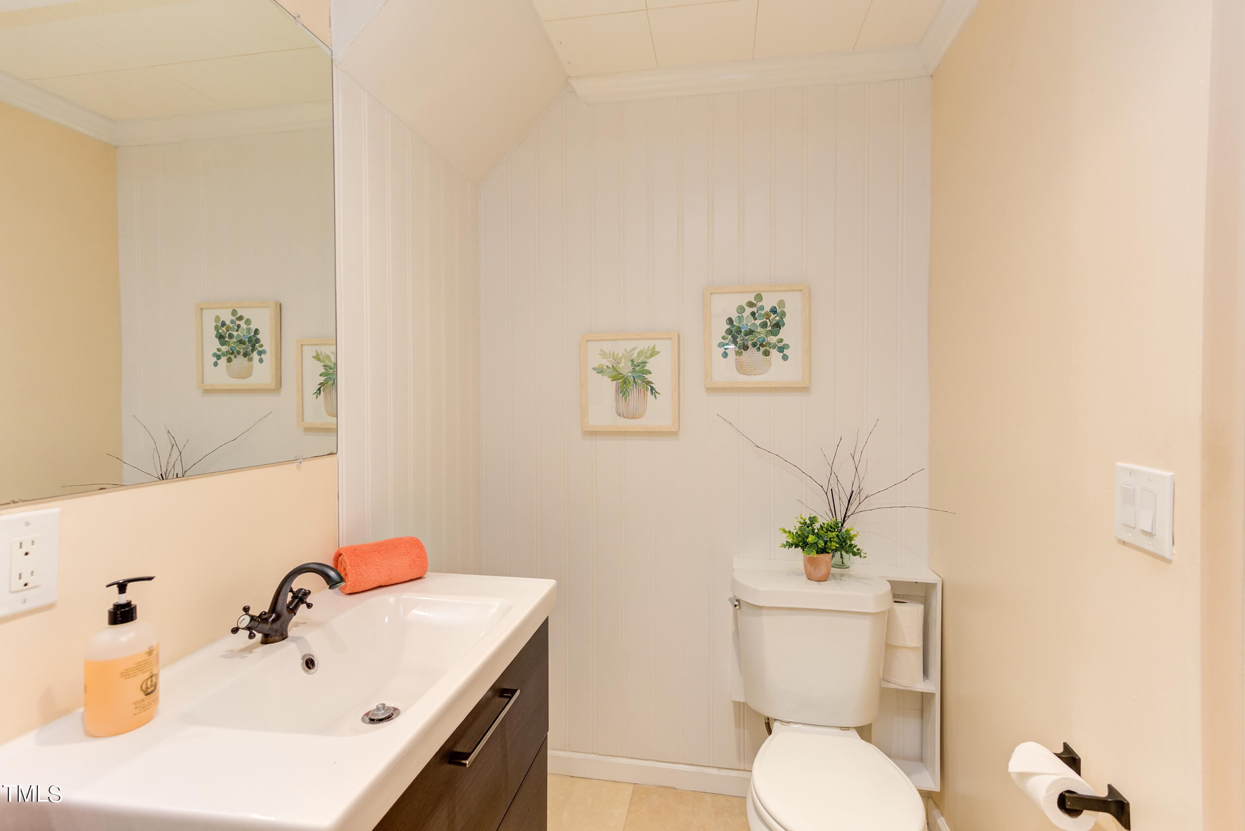 30 Sandstone Ridge Drive Durham, NC 27713 - Photo 38 of 65 a bathroom with a sink mirror and toilet