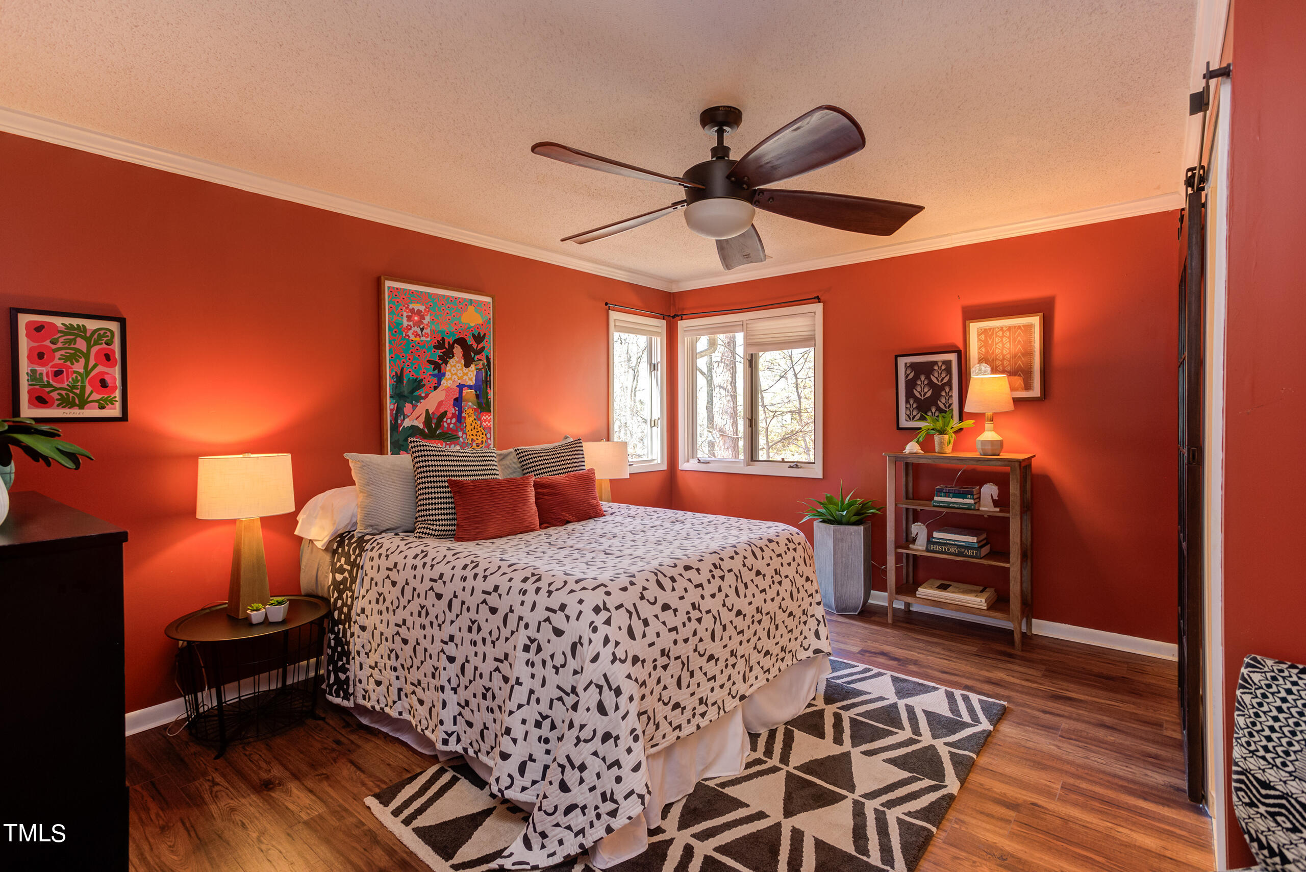 30 Sandstone Ridge Drive Durham, NC 27713 - Photo 39 of 65 a bedroom with a bed and wooden floor