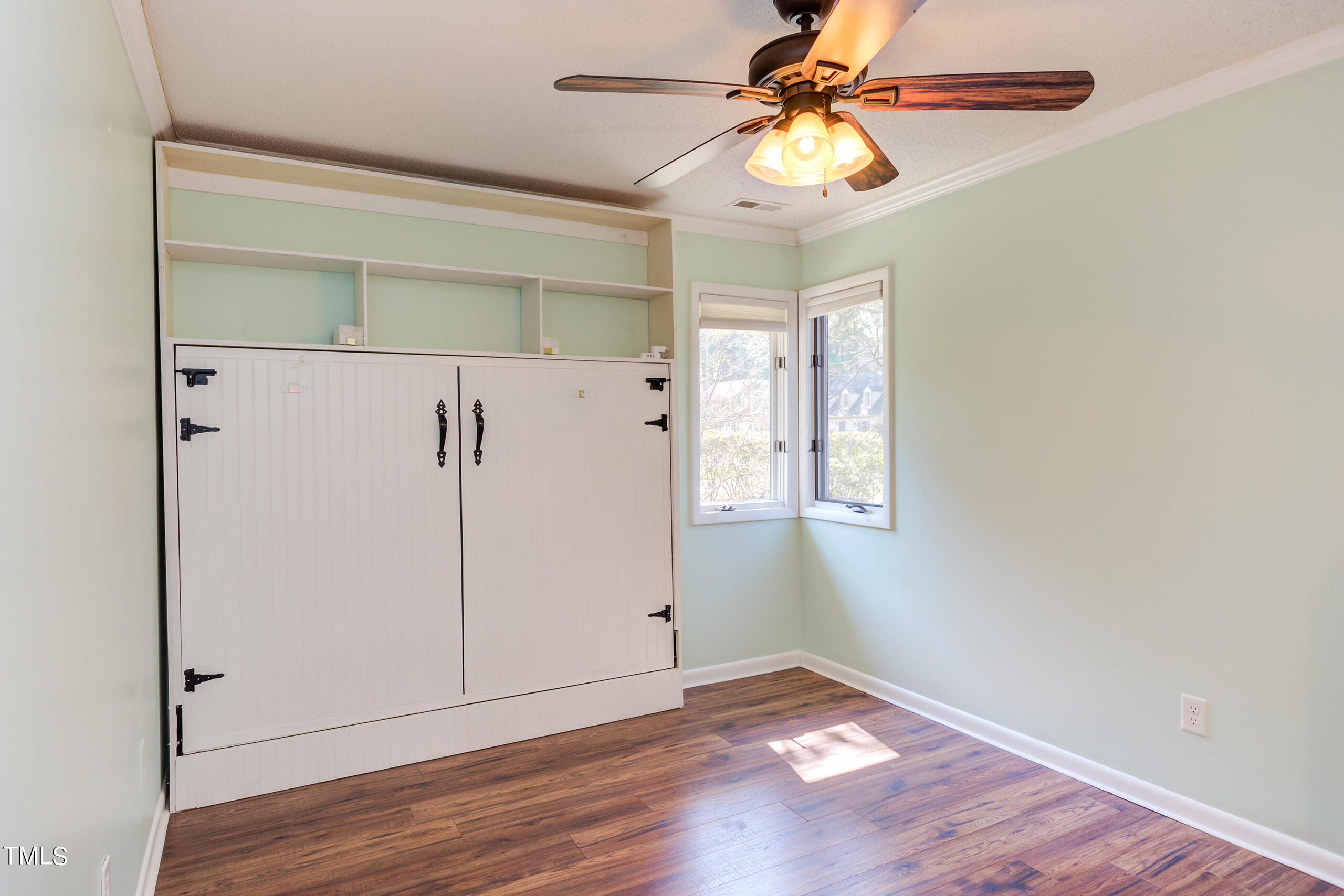 30 Sandstone Ridge Drive Durham, NC 27713 - Photo 44 of 65 wooden floor in an empty room with a window