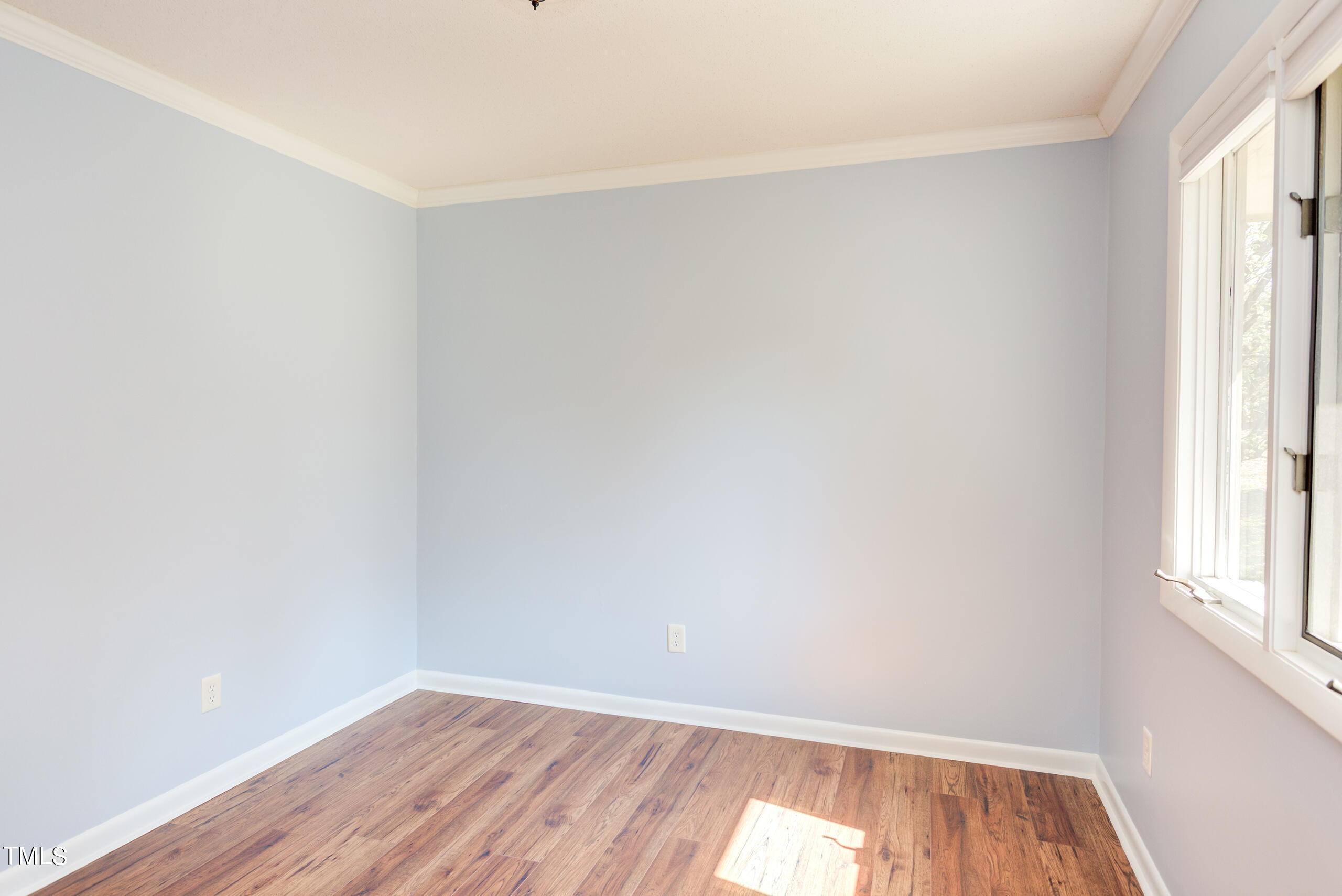 30 Sandstone Ridge Drive Durham, NC 27713 - Photo 47 of 65 an empty room with wooden floor and windows