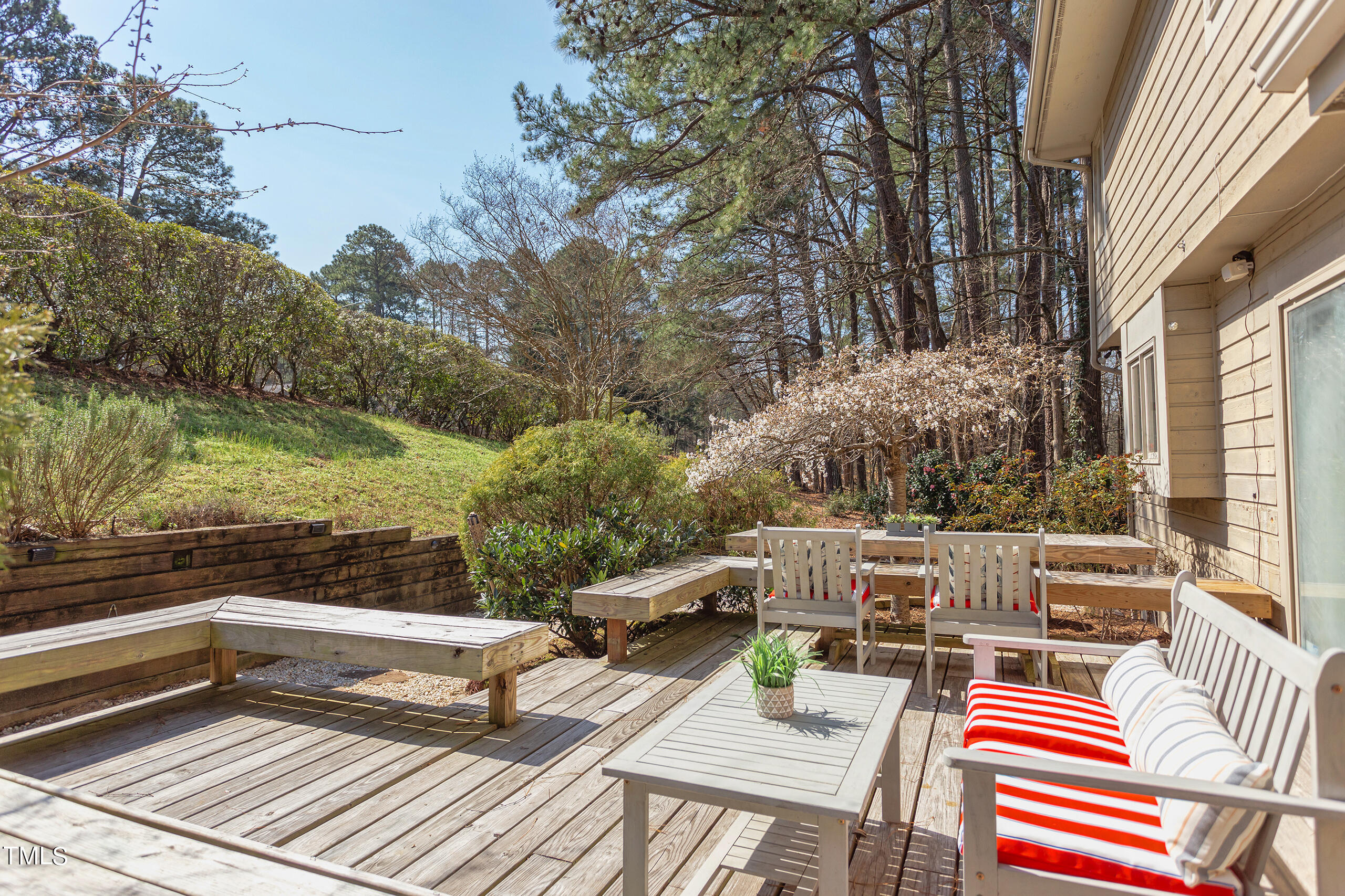 30 Sandstone Ridge Drive Durham, NC 27713 - Photo 52 of 65 a roof deck with couches and wooden floor