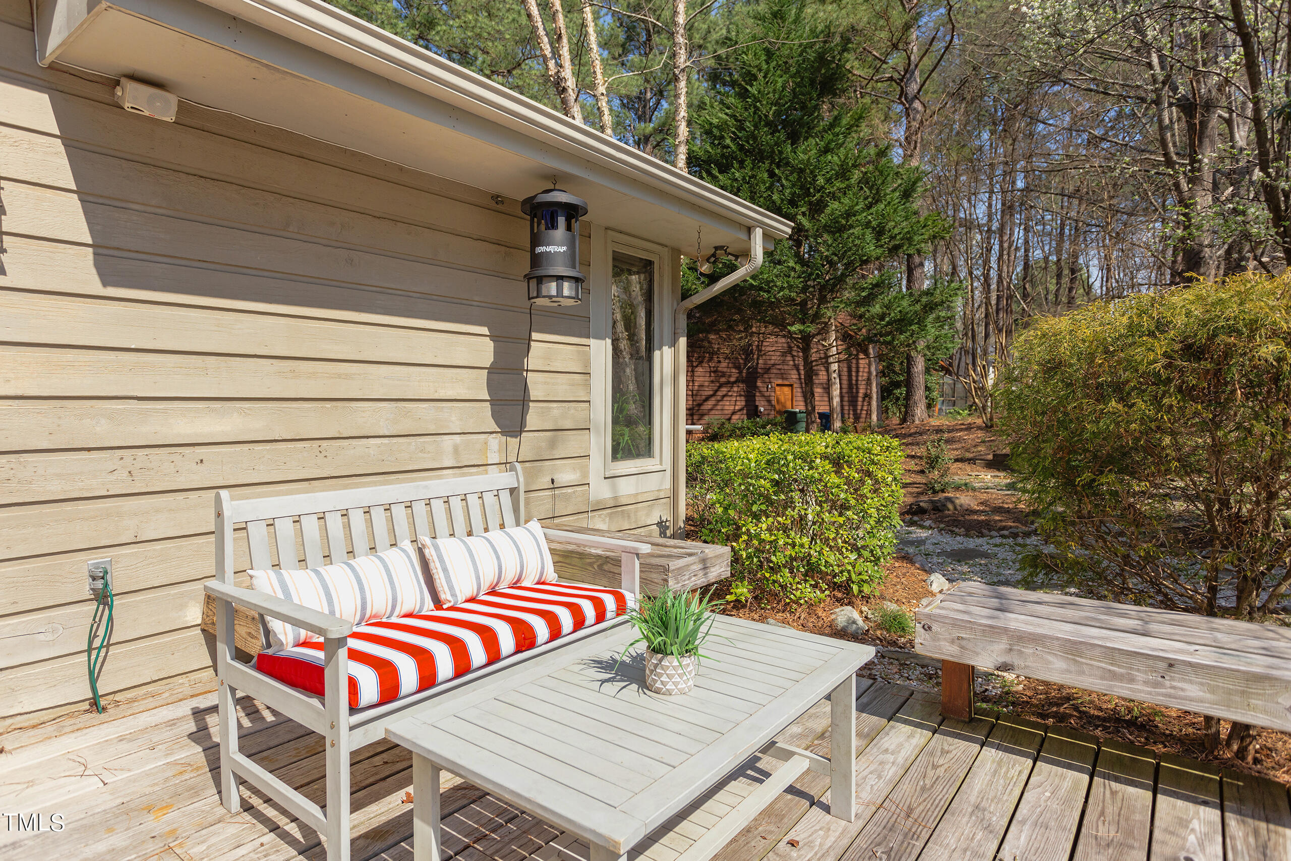 30 Sandstone Ridge Drive Durham, NC 27713 - Photo 54 of 65 a view of a patio with a table and chairs