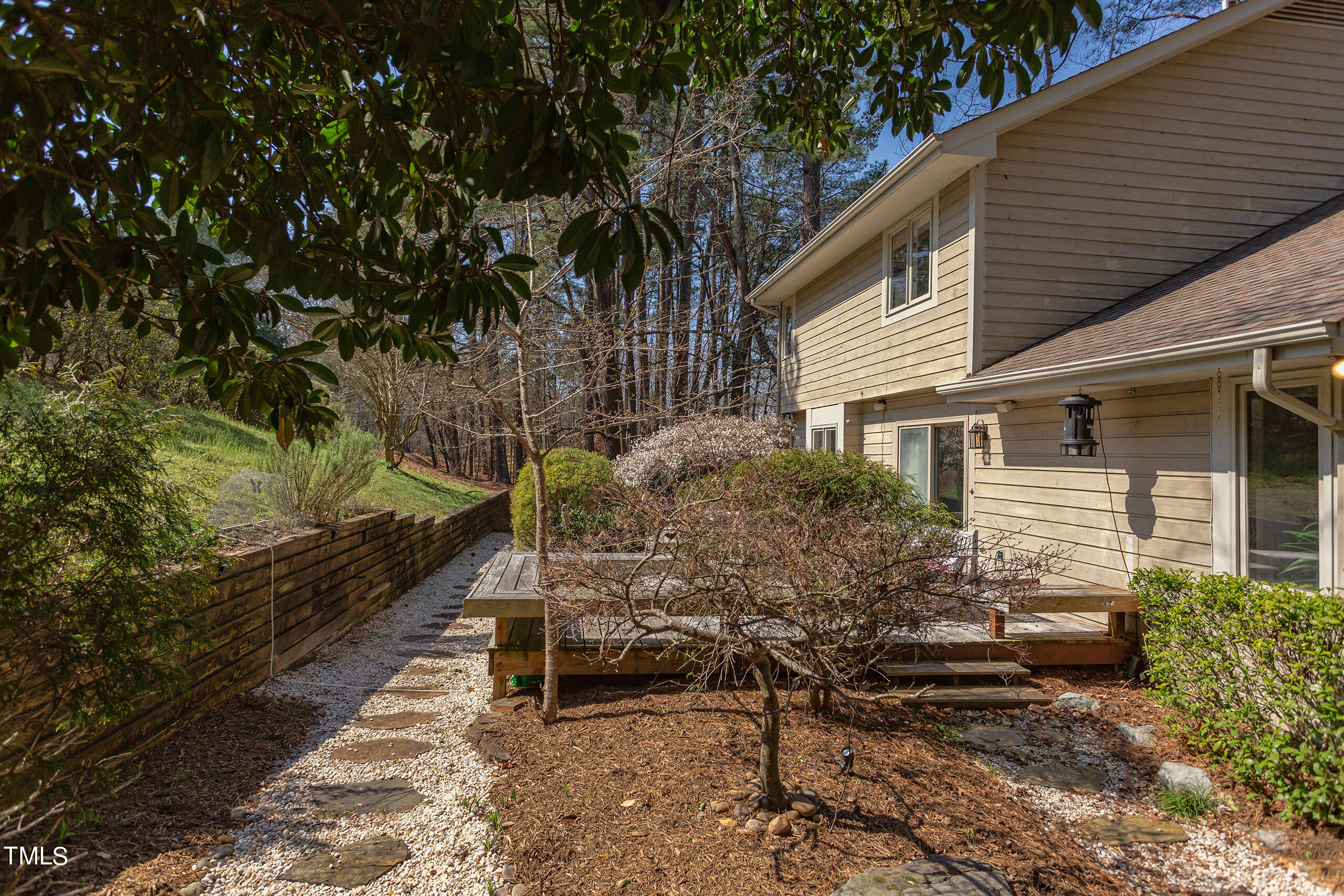 30 Sandstone Ridge Drive Durham, NC 27713 - Photo 61 of 65 a view of house with backyard and sitting area