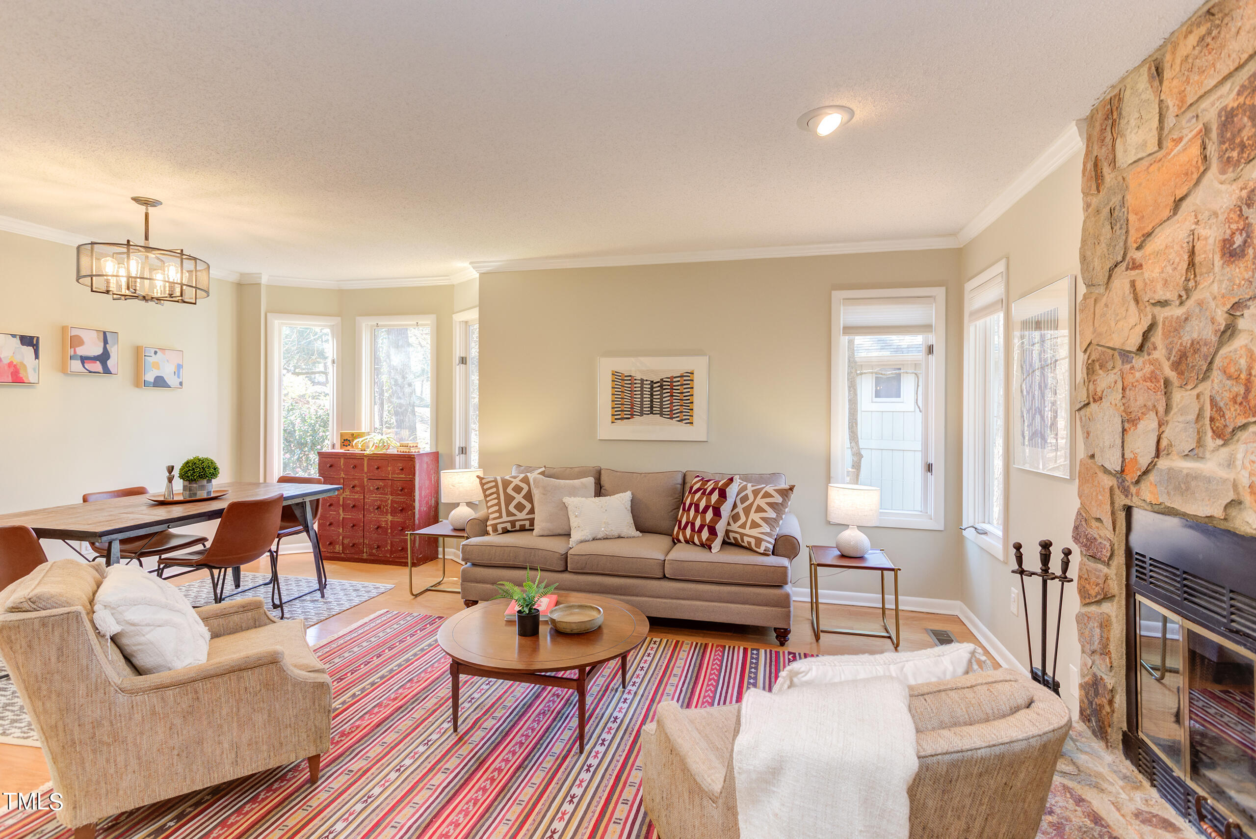30 Sandstone Ridge Drive Durham, NC 27713 - Photo 7 of 65 a living room with fireplace furniture and a rug