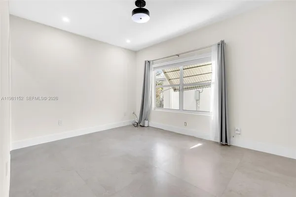 an empty room with window