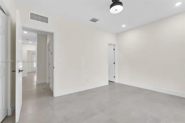 a kitchen with stainless steel appliances a stove sink and microwave