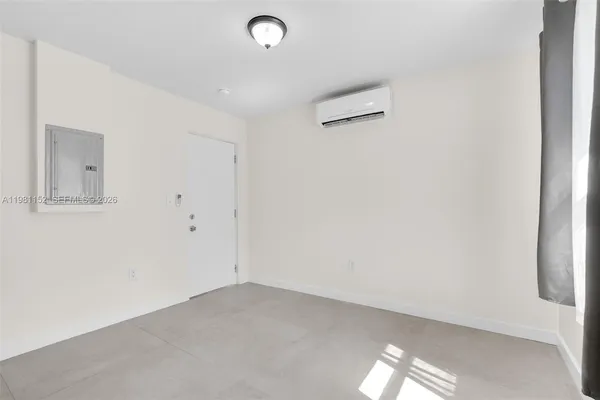 a view of a room with an empty space