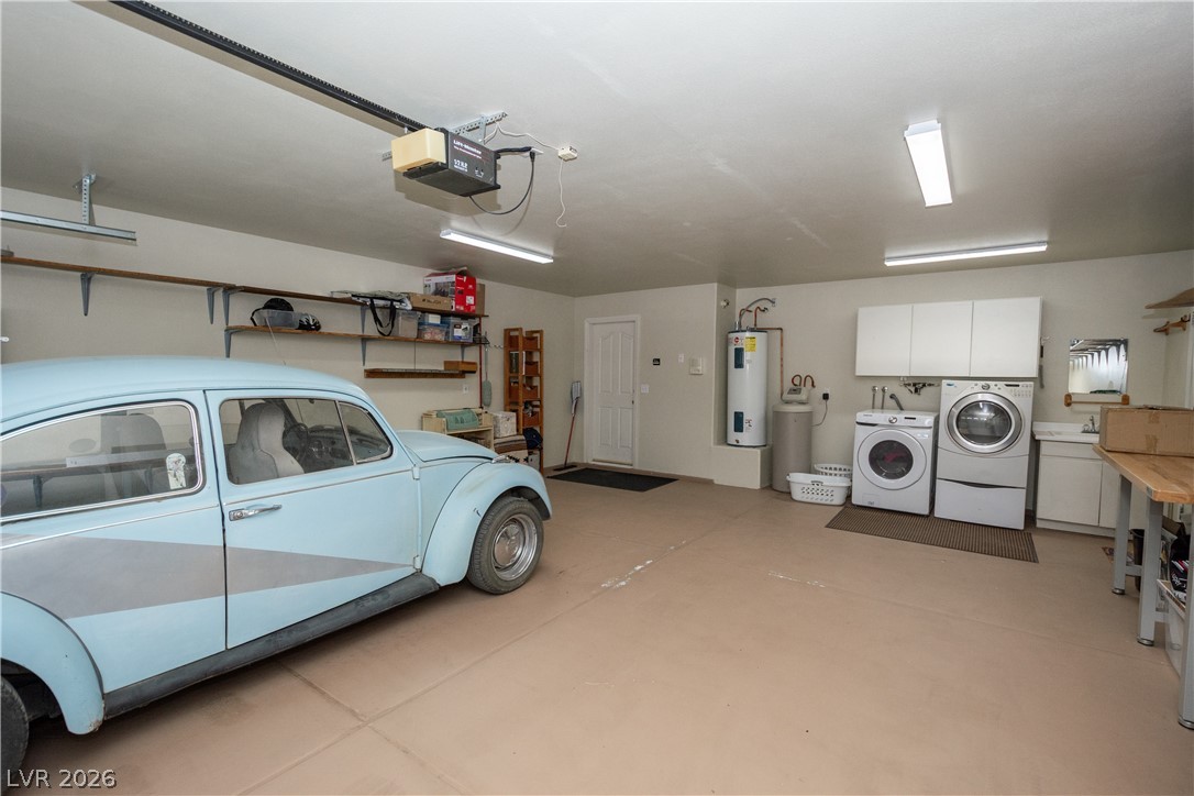2381 Tough Boy Road Pahrump, NV 89060 - Photo 35 of 44 This spacious garage offers ample storage and convenient laundry facilities.
